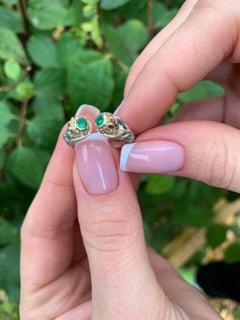 Skull ring with emerald in 14k gold