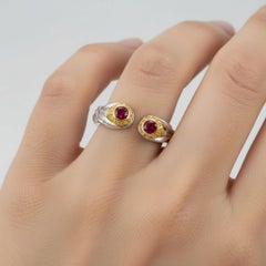 Skull ring with ruby in silver, gold