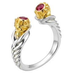 Skull ring with ruby in silver, gold