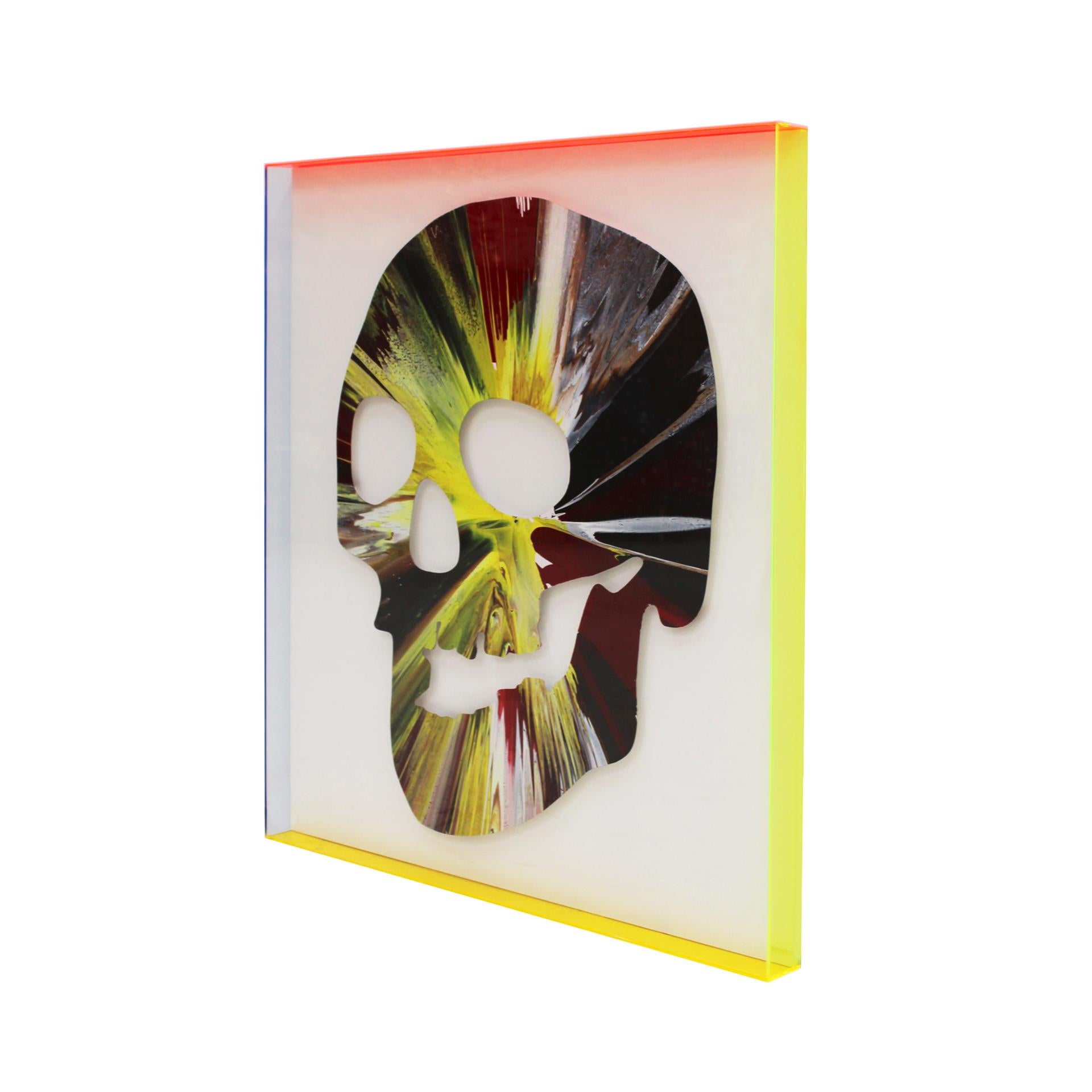Skull spin painting by artist Damien Hirst.

Work in acrylic, framed in a methacrylate case with sides in fluorescent colors and a wooden background that reveals the artist's signature on the back.

This piece of art was made to celebrate the