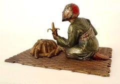 Skulptur, Araber mit Bananen auf Teppich sitzend, Wien, Anfang 20. Jh., Bronze