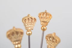 Skultuna. Four cocktail sticks with gilt crown finials. Late 20th C.