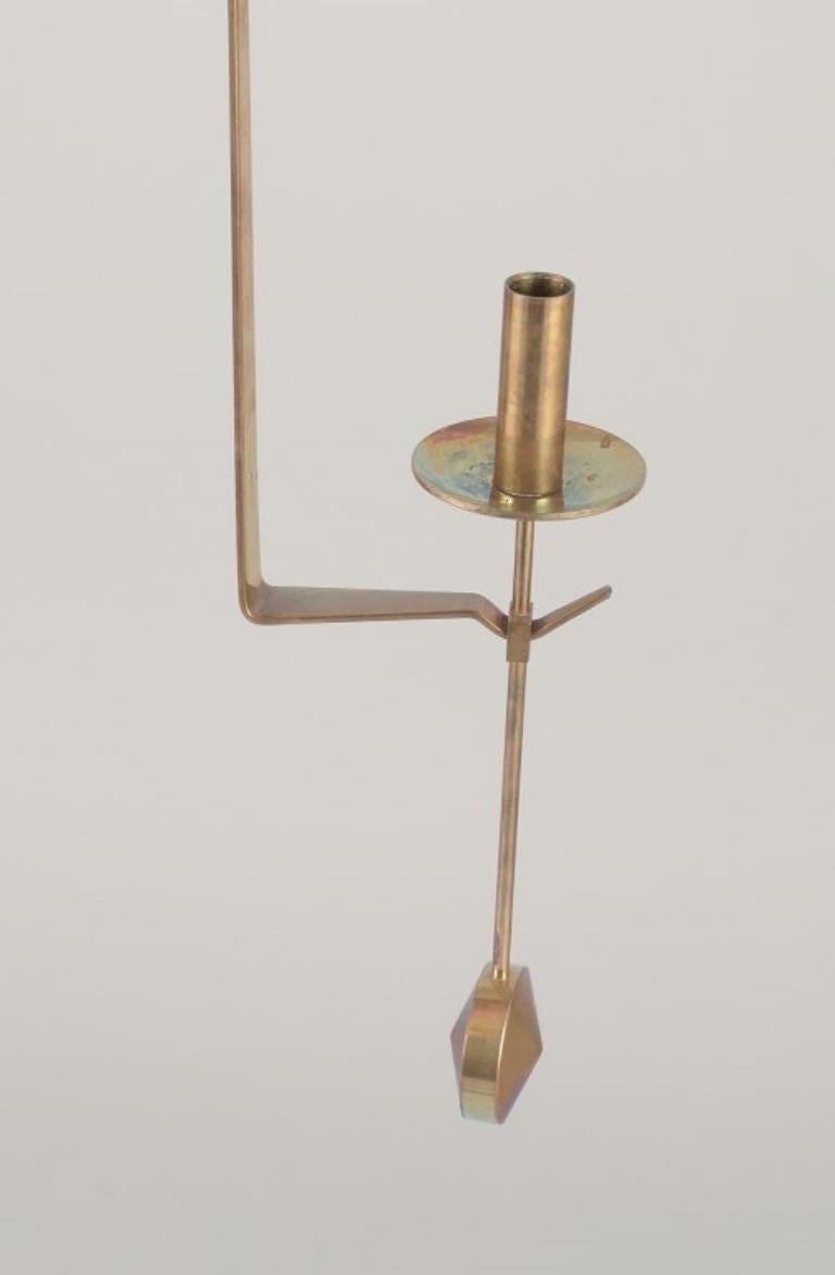 Scandinavian Modern Skultuna, Sweden. Pair of wall-mounted candle sconces in brass. 1970/80s For Sale