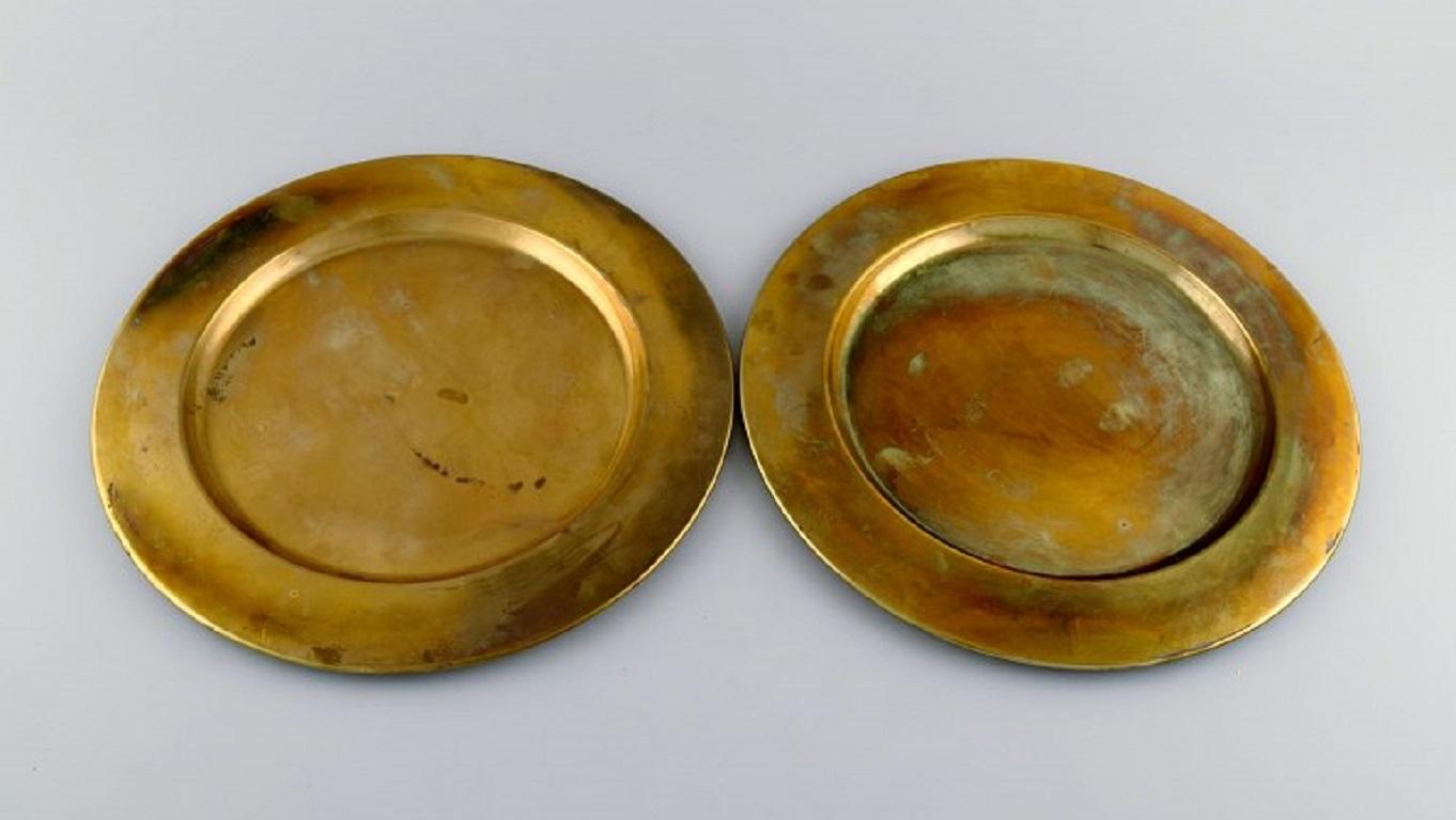 Skultuna, Sweden. Six brass cover plates. 1960s.
Measure: diameter: 30 cm.
In excellent condition.
Stamped.