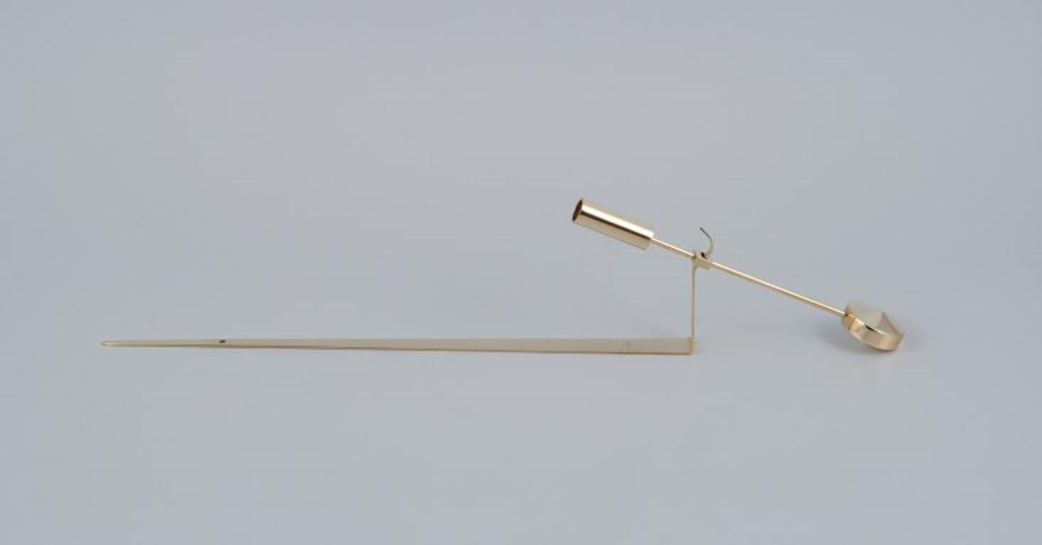 Scandinavian Modern Skultuna. Two wall-mounted candle holders in brass. Designed by Pierre Forsell For Sale