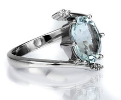 Sky Blue Aquamarine and Diamond Cross over Ring in 18 Carat White Gold