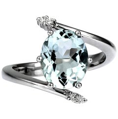 Sky Blue Aquamarine and Diamond Cross over Ring in 18 Carat White Gold
