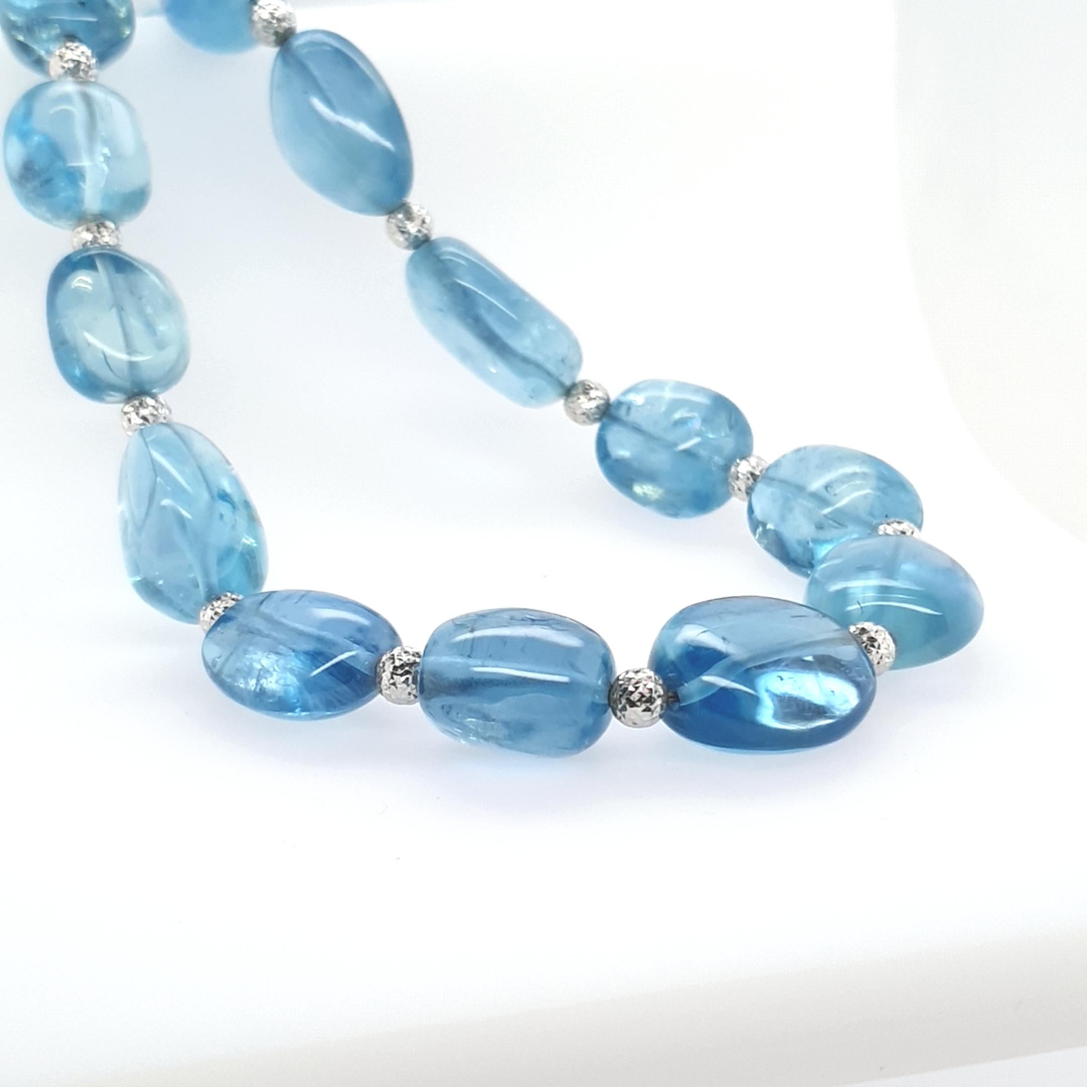 This exceptional Sky Blue Aquamarine Baroque Beaded Necklace with 18 Carat White Gold beads and clasp is totally handmade on German quality standard. The screw clasp is easy to handle and very secure.
Timeless and classic design combined with very