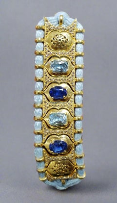 Bracciale in argento intrecciato con acquamarina azzurra, cianite e diamanti