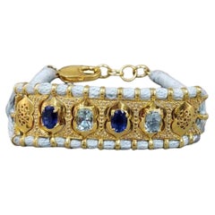Bracciale in argento intrecciato con acquamarina azzurra, cianite e diamanti