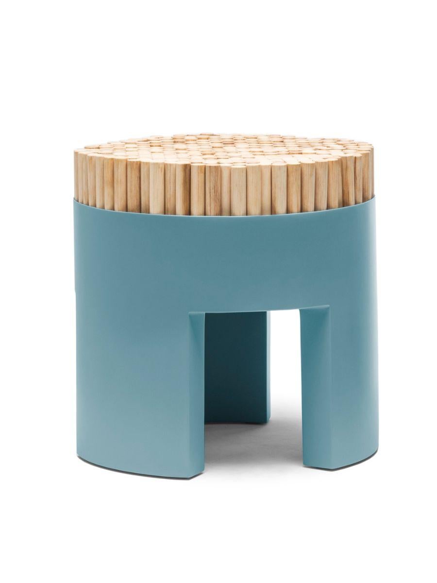 Chiquita sky blue stool by Kenneth Cobonpue
Materials: Rattan, Polyurethane foam, steel. 
Dimensions: Diameter 45 cm x Height 46cm 

Chiquita is a bundle of charms with its clever design and functionality. The Chiquita stool’s vertical sections