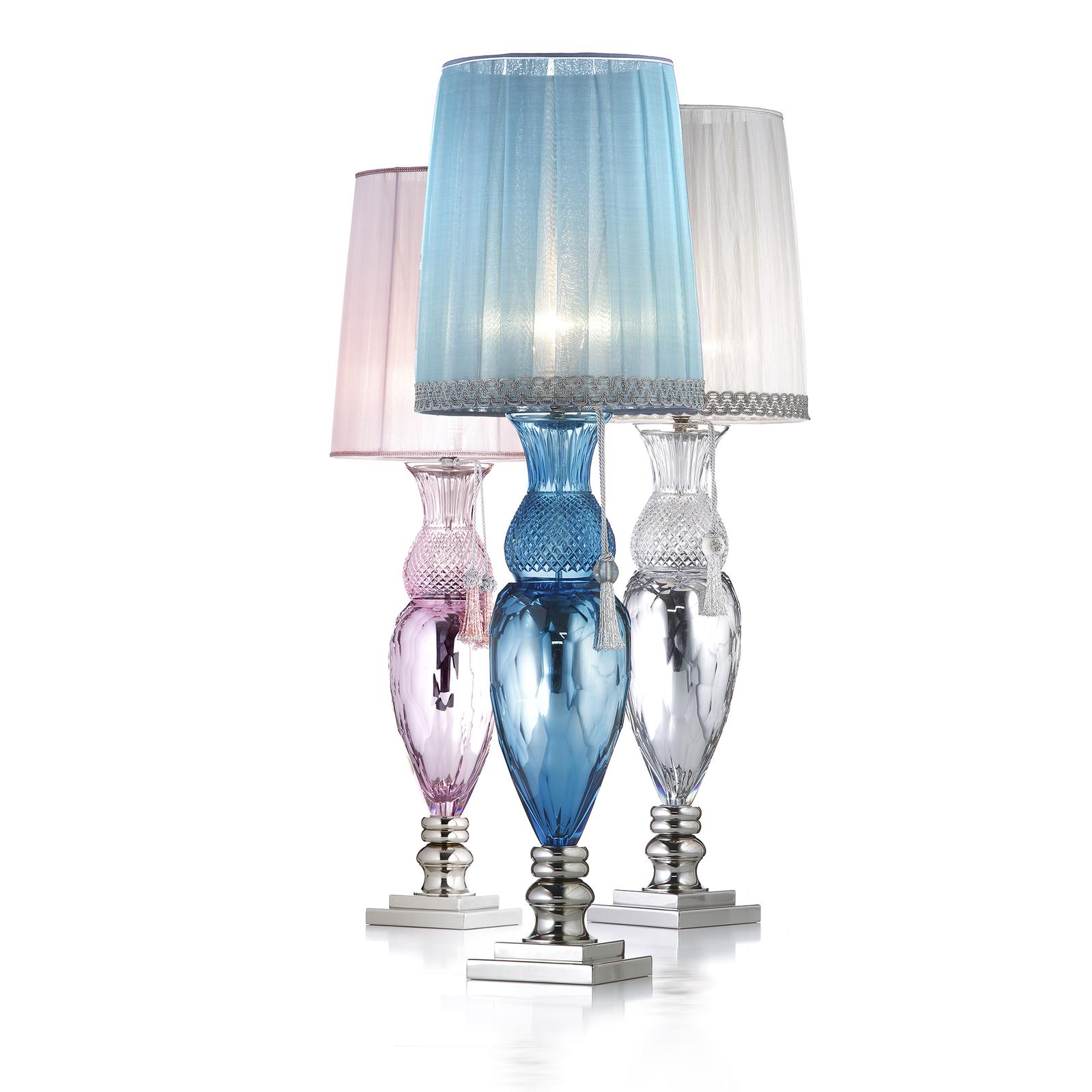 A vivid pop of color and a stunning silhouette, combined with the use of exquisite materials, make this table lamp a superb addition to a luxurious interior. Either on a nightstand, entryway console or desk in the study, this piece will make a