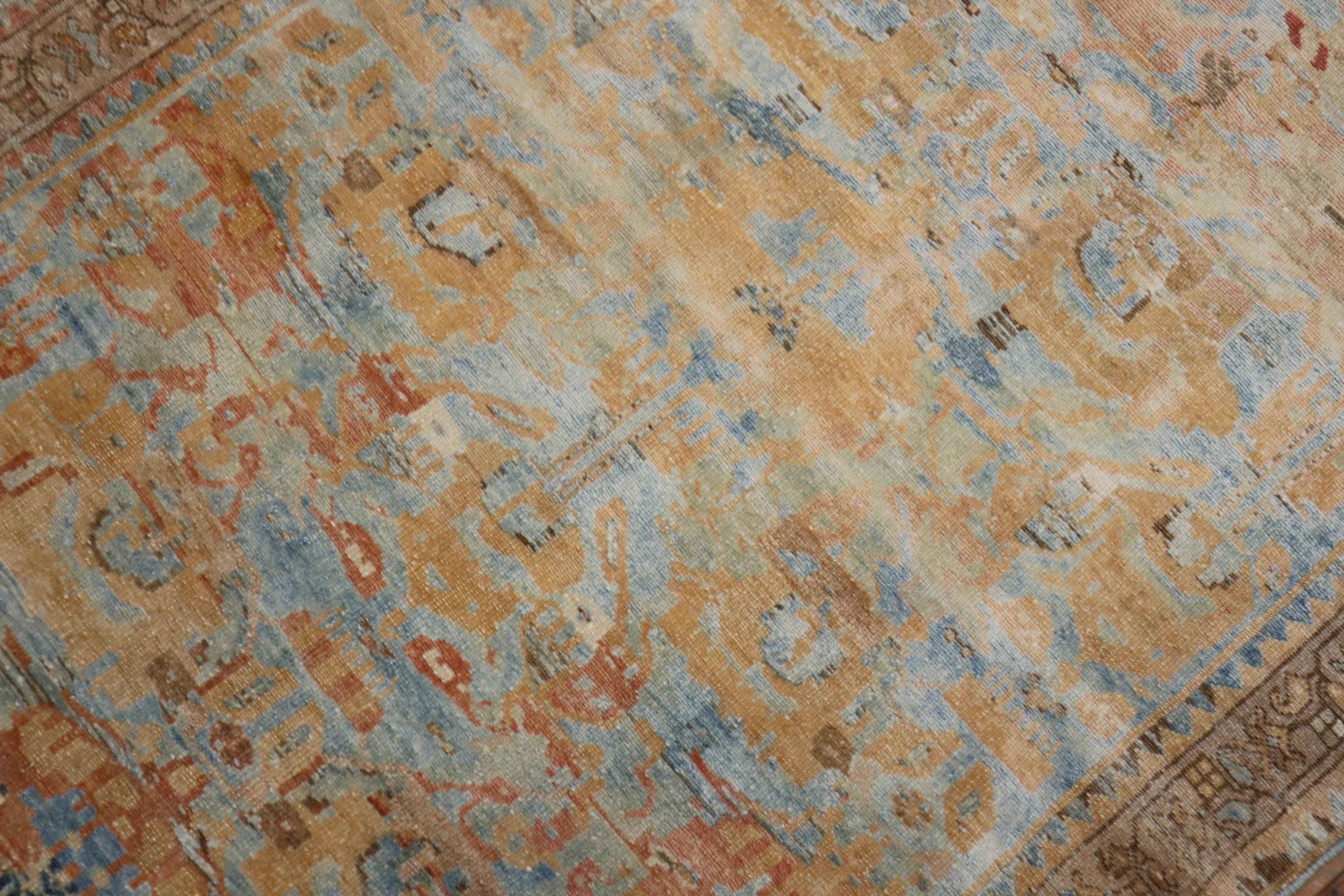 Lovely Persian throw scatter size rug with a sky blue field, the main accent color is in peach,

circa 1940. Measures: 3'5