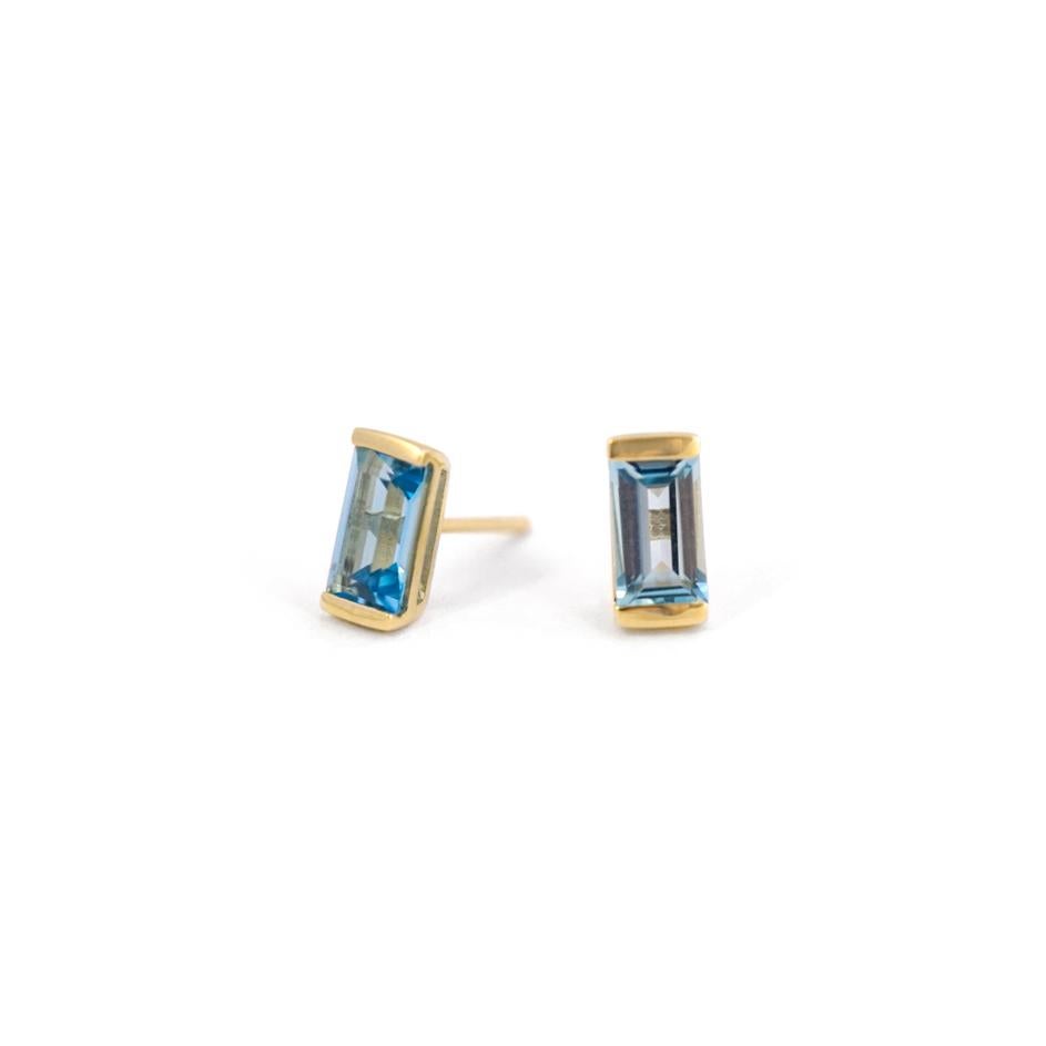 

How sweet are these Bonbon studs? The PERFECT pair of earrings when you need a pop of color. Just the right size, just the right oomph.

14ky gold with the most cheery blue topaz.