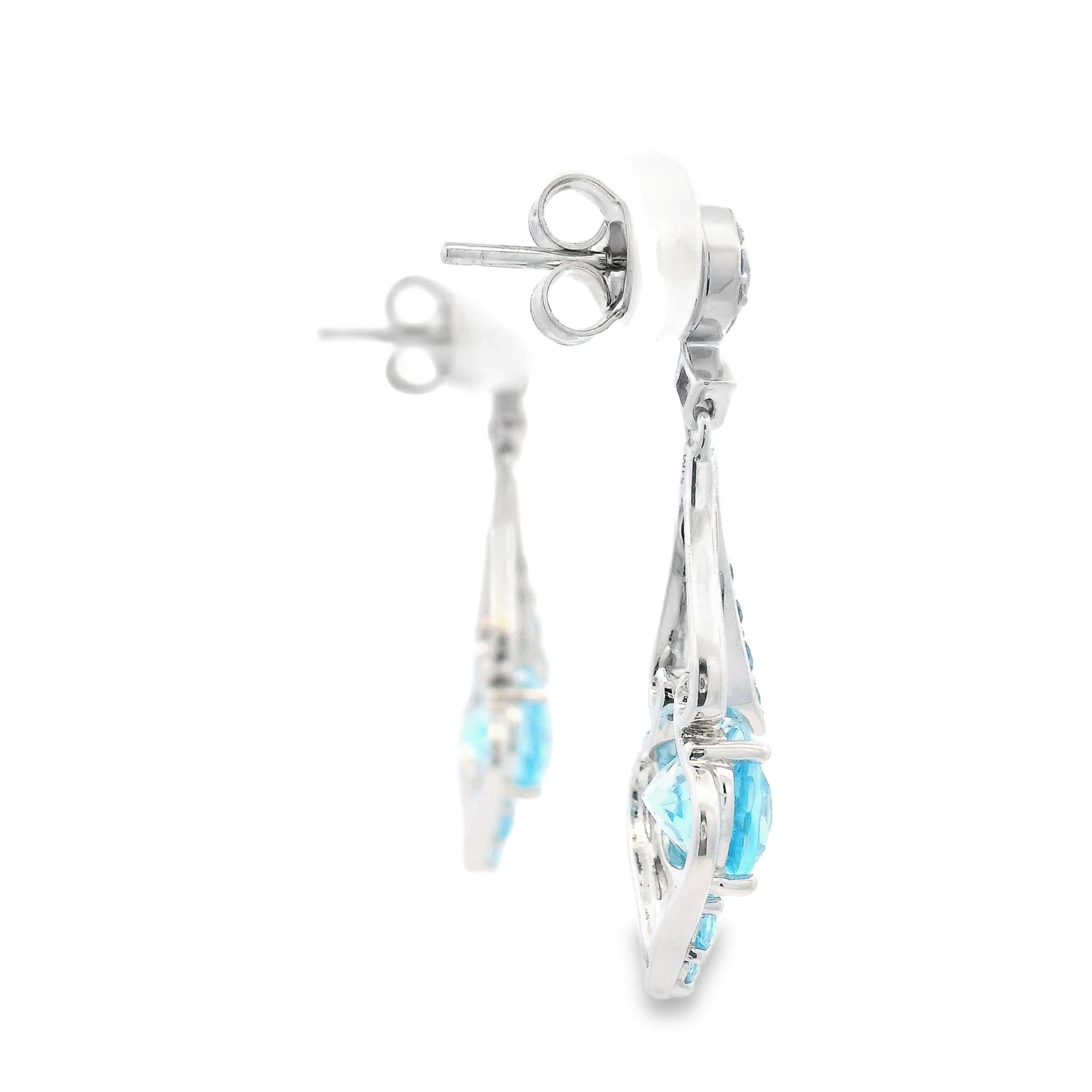 Femenino o masculino Sky Blue Topaz Heart Drop Earrings 10x8MM Ovals in 14K White Gold en venta