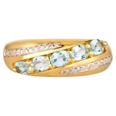 Sky Blue Topaz Ring With White Topaz 1.11 Carats Gold Plated Silver