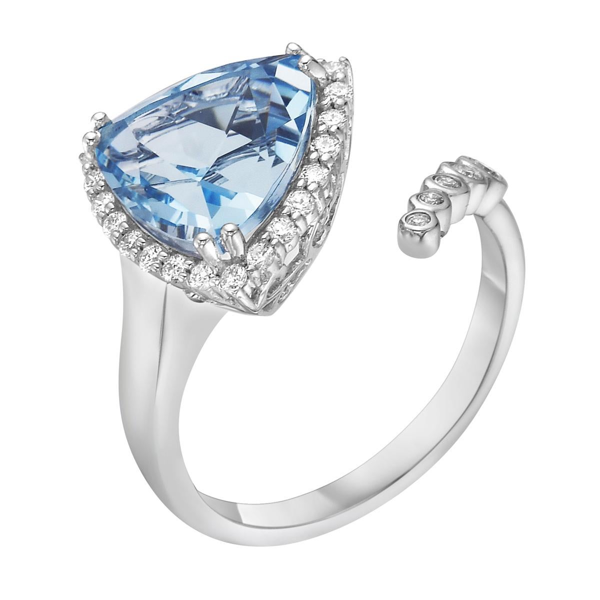 With this exquisite semi-precious sky blue topaz white gold bypass diamond ring, style and glamour are in the spotlight. This 14-karat trillion cut ring is made from 3.2 grams of gold, 1 sky blue topaz totaling 4.36 karats, as well as 29 round