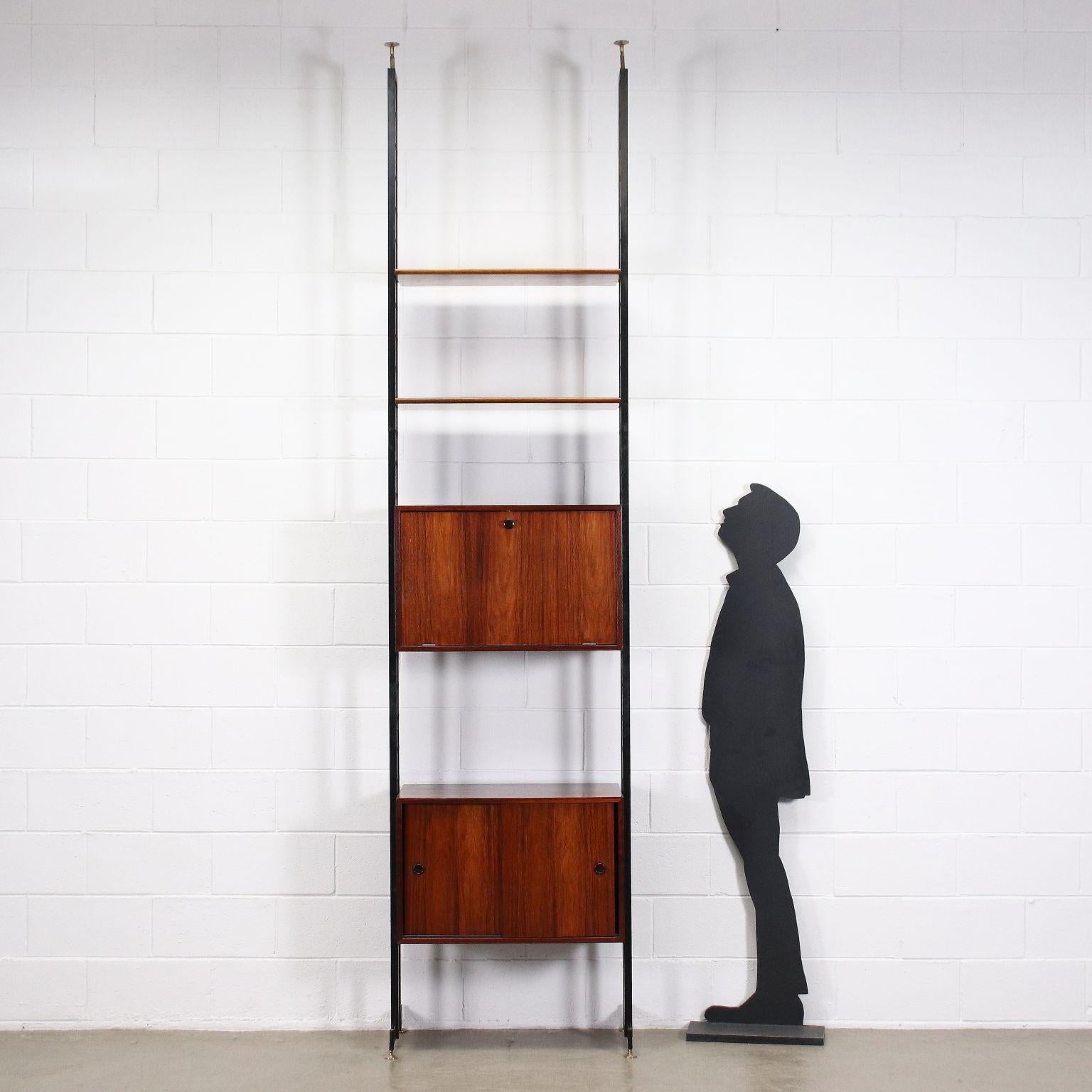 Sky-Earth bookcase from the center of the 1960s with metal uprights, brass feet and shelves and container elements with adjustable position, rosewood veneer.