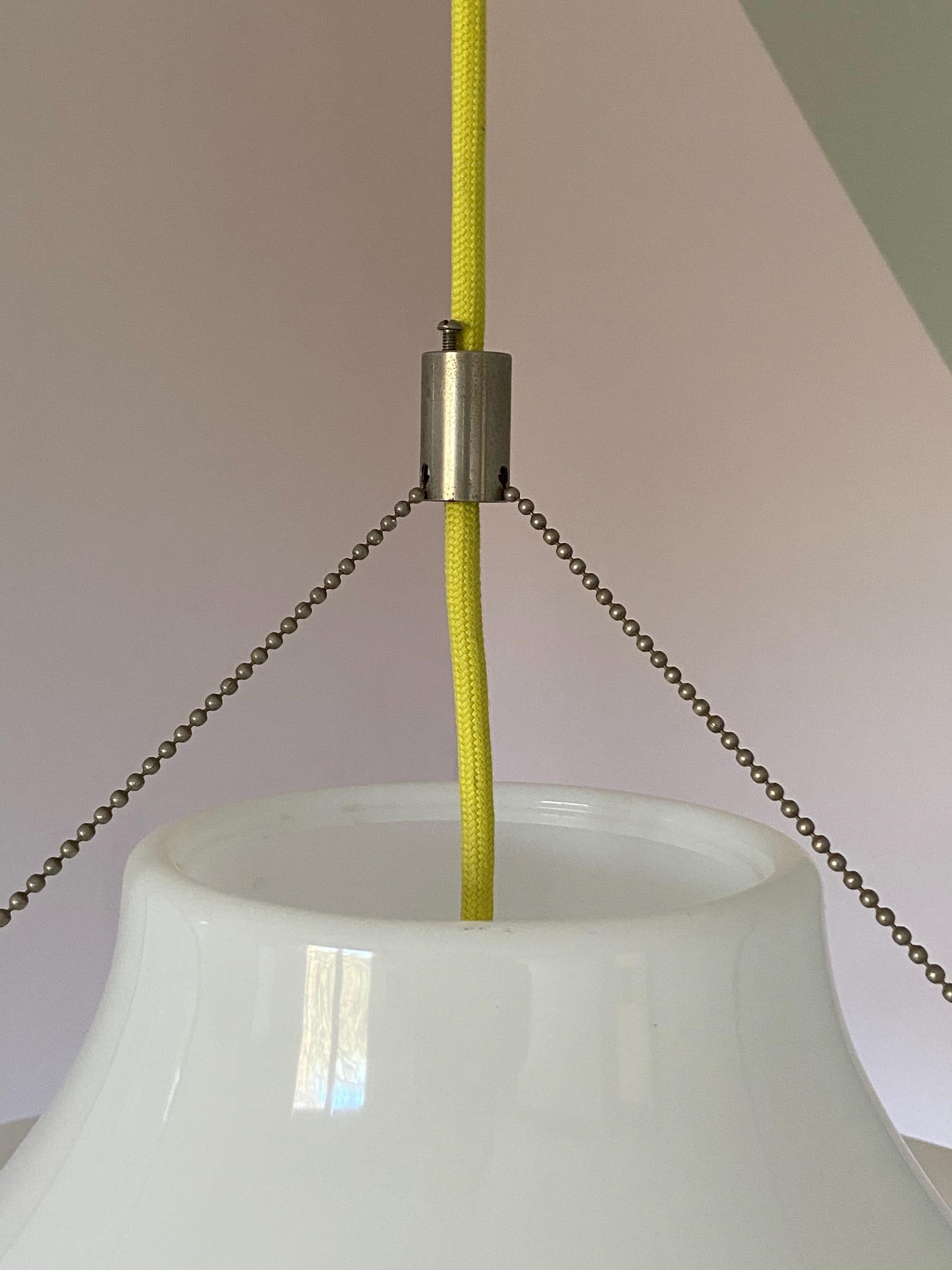 Ceiling lamp ‘Sky Flyer’ designed by Yki Nummi, Made in Finland. 1960s.
Acrylic and steel, adjustable height. No damages with yellow fabric cord and E26/27 Edison socket. Ready to use.