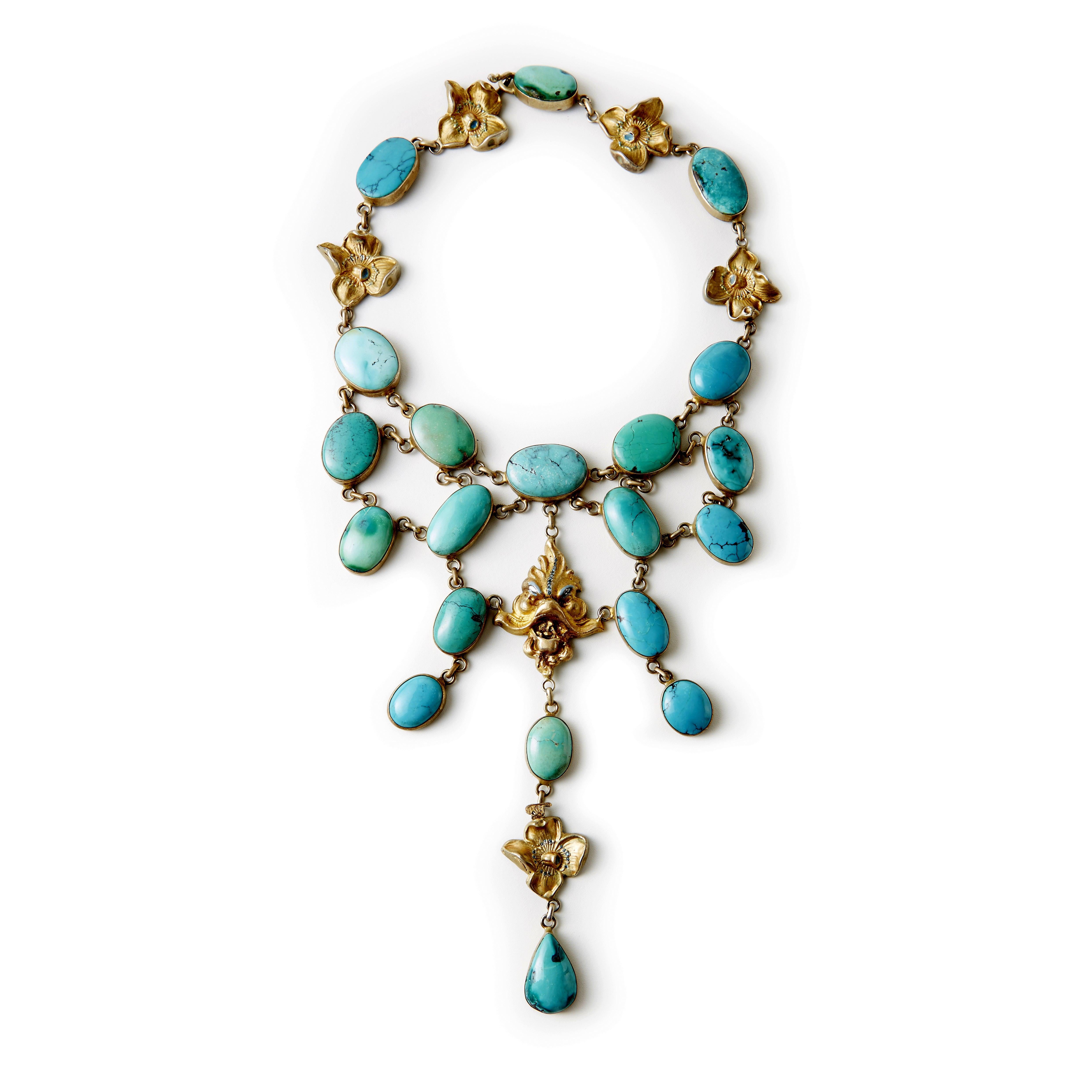 Erin Mac Original - Antique Style Goddess Face and Flowers in silver gilt, set between Turquoise cabochons, some pieces sprinkled with treated Blue Diamonds. Very comfy flexible-designed Stylish Necklace . 