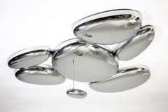 Skydro di Artemide, lampada da soffitto o sconce