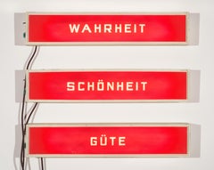 Wahrheit, Schönheit, Güte (lighted signs)