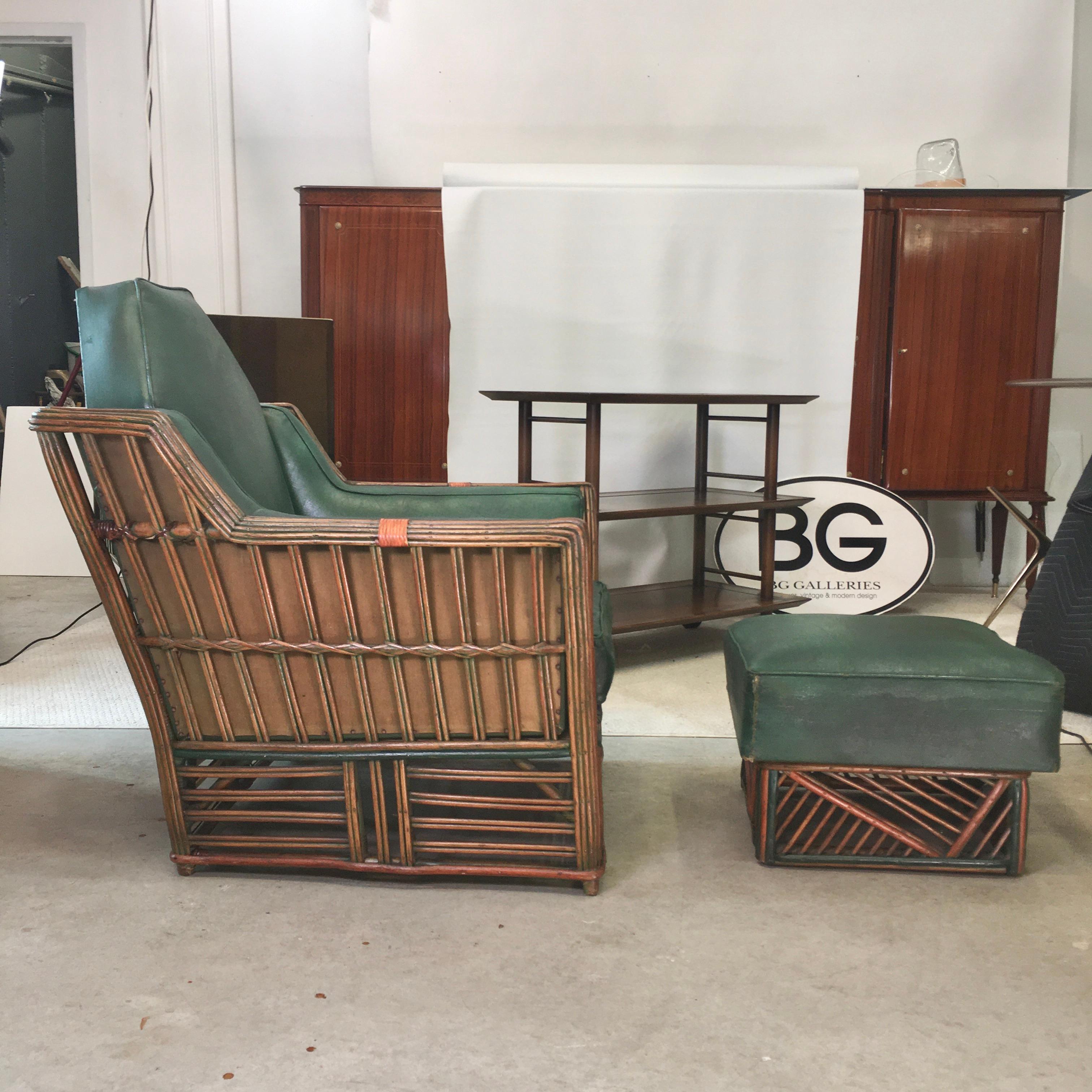This is a grand old ocean liner from the 1920s, a stick reed rattan lounge chair and ottoman with their original forrest green oilcloth upholstered cushions.
Extraordinary geometric design, particularly the tombstone shaped back cushion, straddling