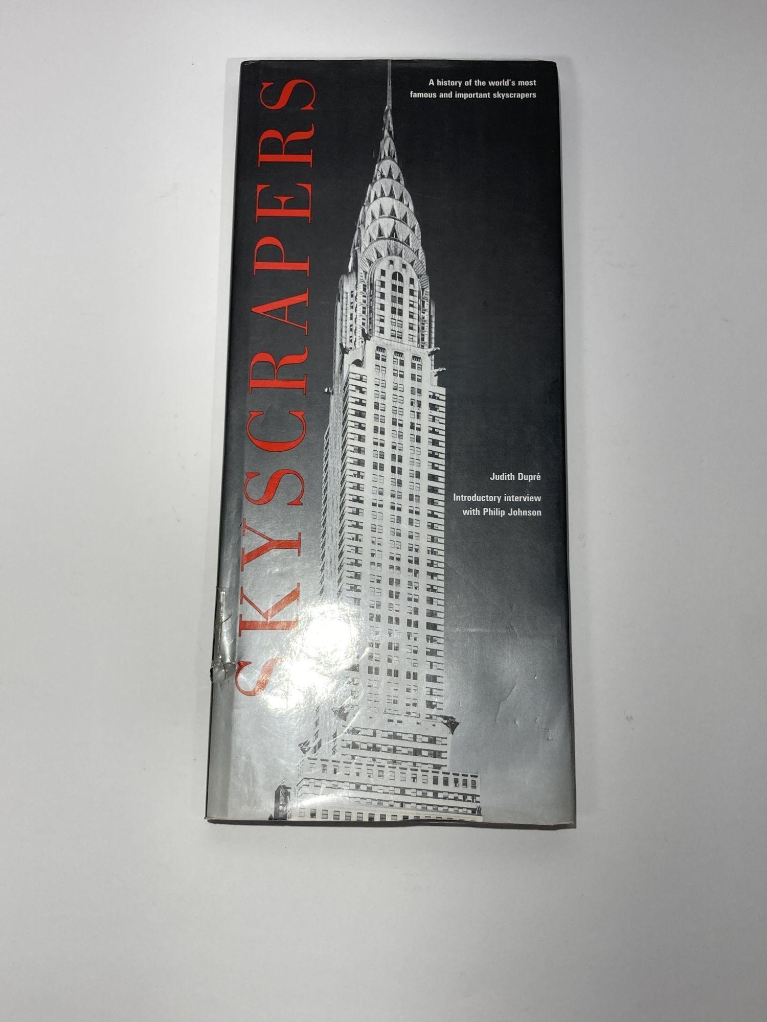 Skyscrapers: A History of the World's Most Famous and Important Skyscrapers. 
By Judith Dupre, Published by Black Dog & Leventhal Publishers, New York, N.Y., 1996.
1st Edition, 1st Printing.
Extremely tall elephant folio (18 inches tall x 8