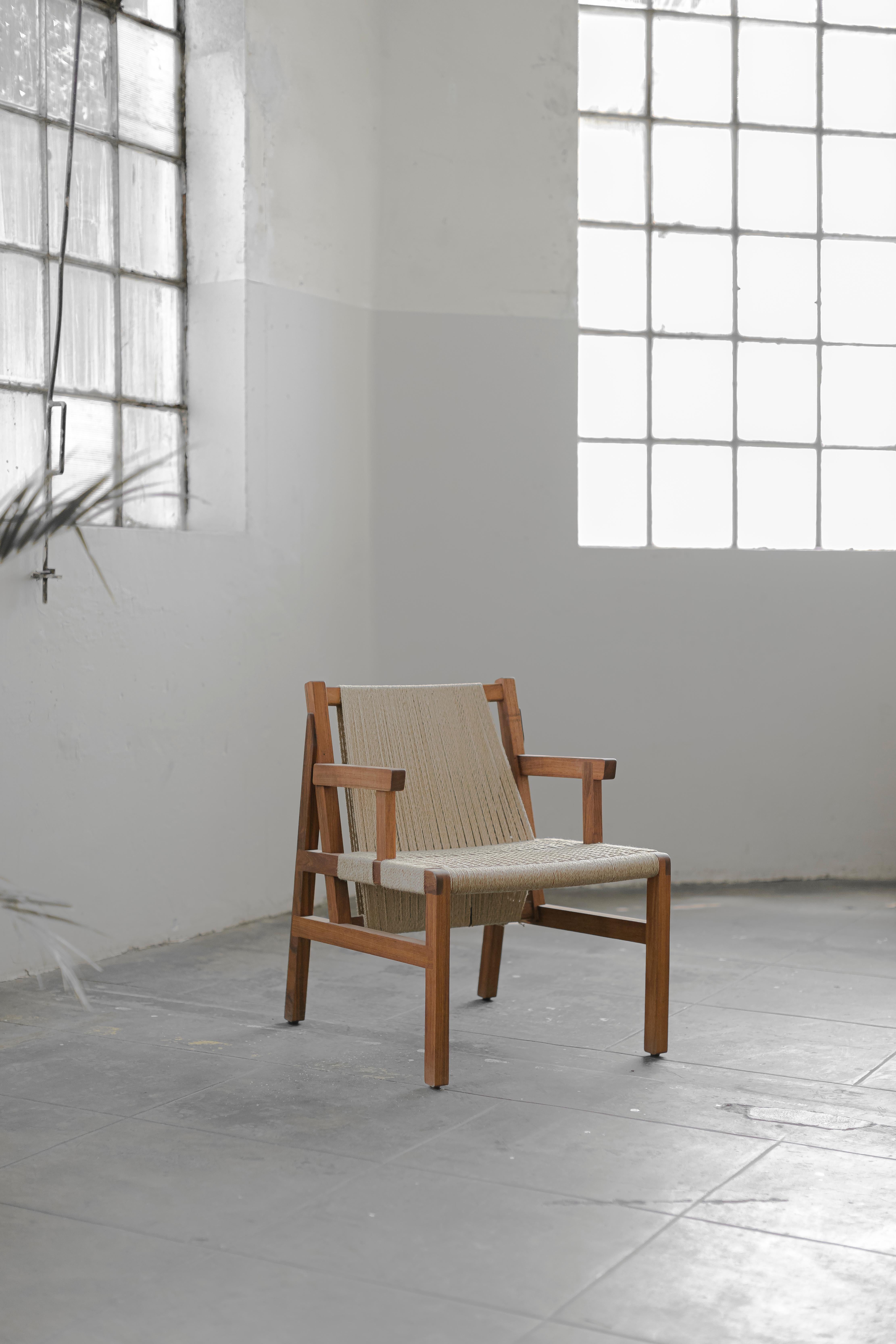 SL Collection wooden chair with armrest woven with jute made of oak or tzalam wood.