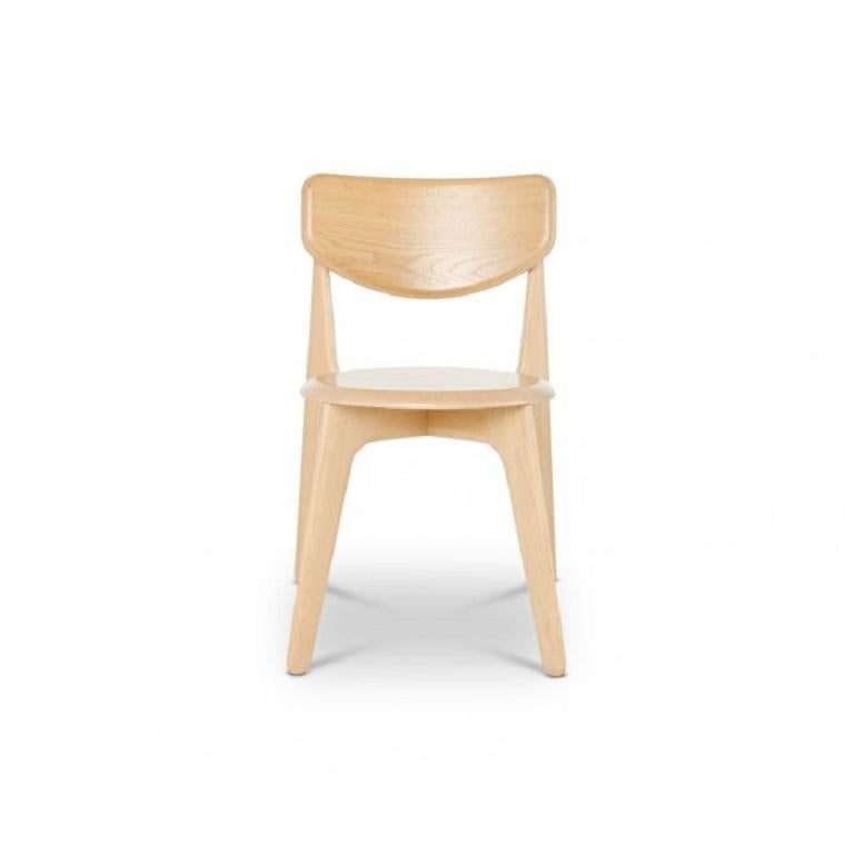 Slab is a modern dining chair, made in Lithuania using solid wood oak. In a natural finish, this dining chair is an honest piece of skilled woodwork that is both stackable and comfortable.
  