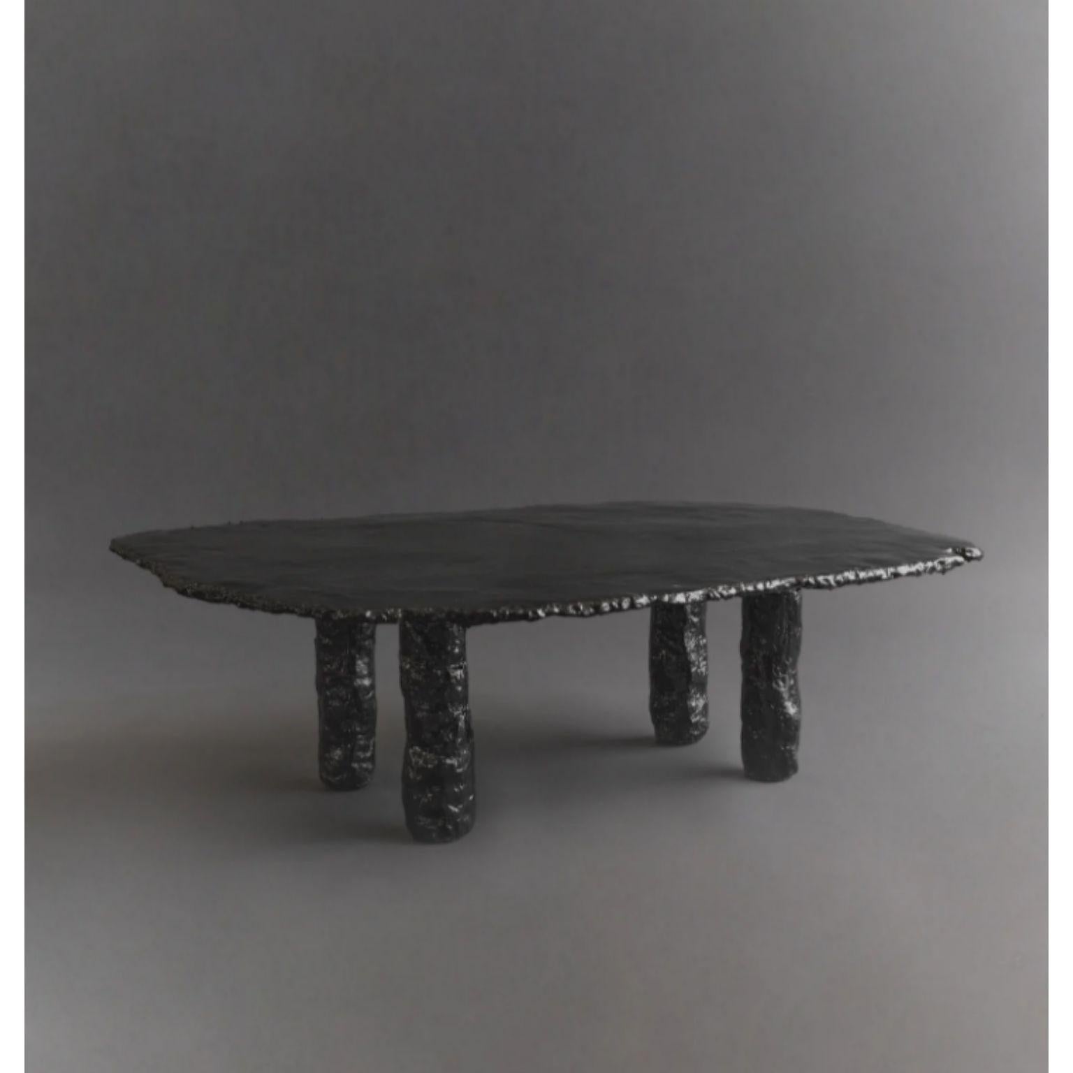 Slab coffee table 01 by Ombia
Dimensions: W 127 x D 82 x H 38 cm
Materials: Mix media, black resin finish.
Custom sizes and finishes upon request.


Ombia is a ceramic sculpture and design studio based in Los Angeles. The name and its roots