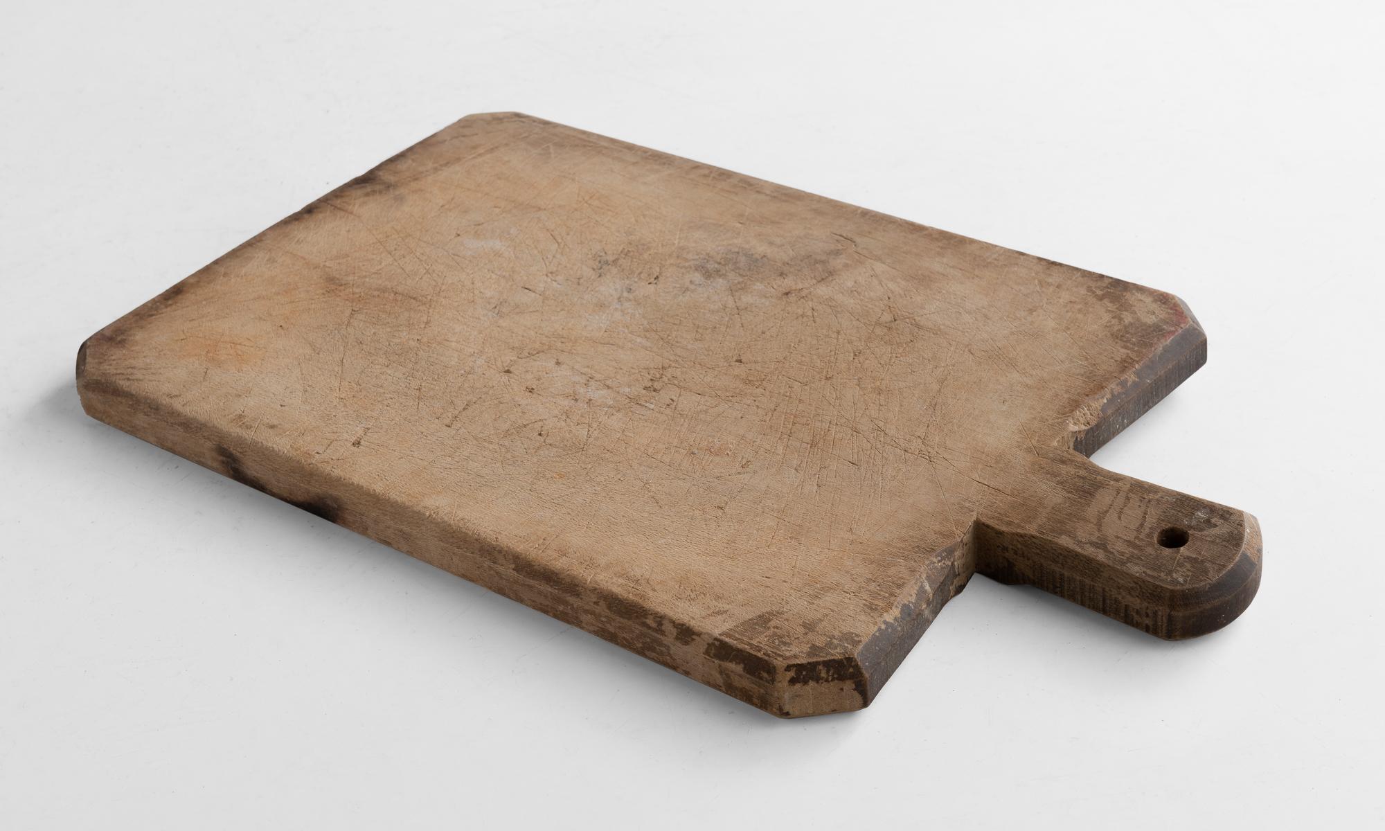 Slab cutting board, circa 1900

Double sided, beautifully worn primitive form with angular features.