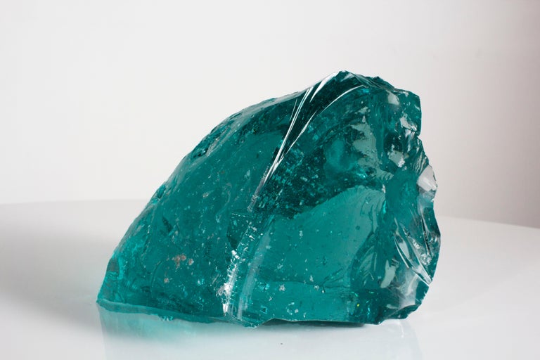 Unique shaped pieces of slag glass. Each piece will vary in size and shape. Slag glass comes from the glass used to make car windows. These pieces were sourced in Texas.