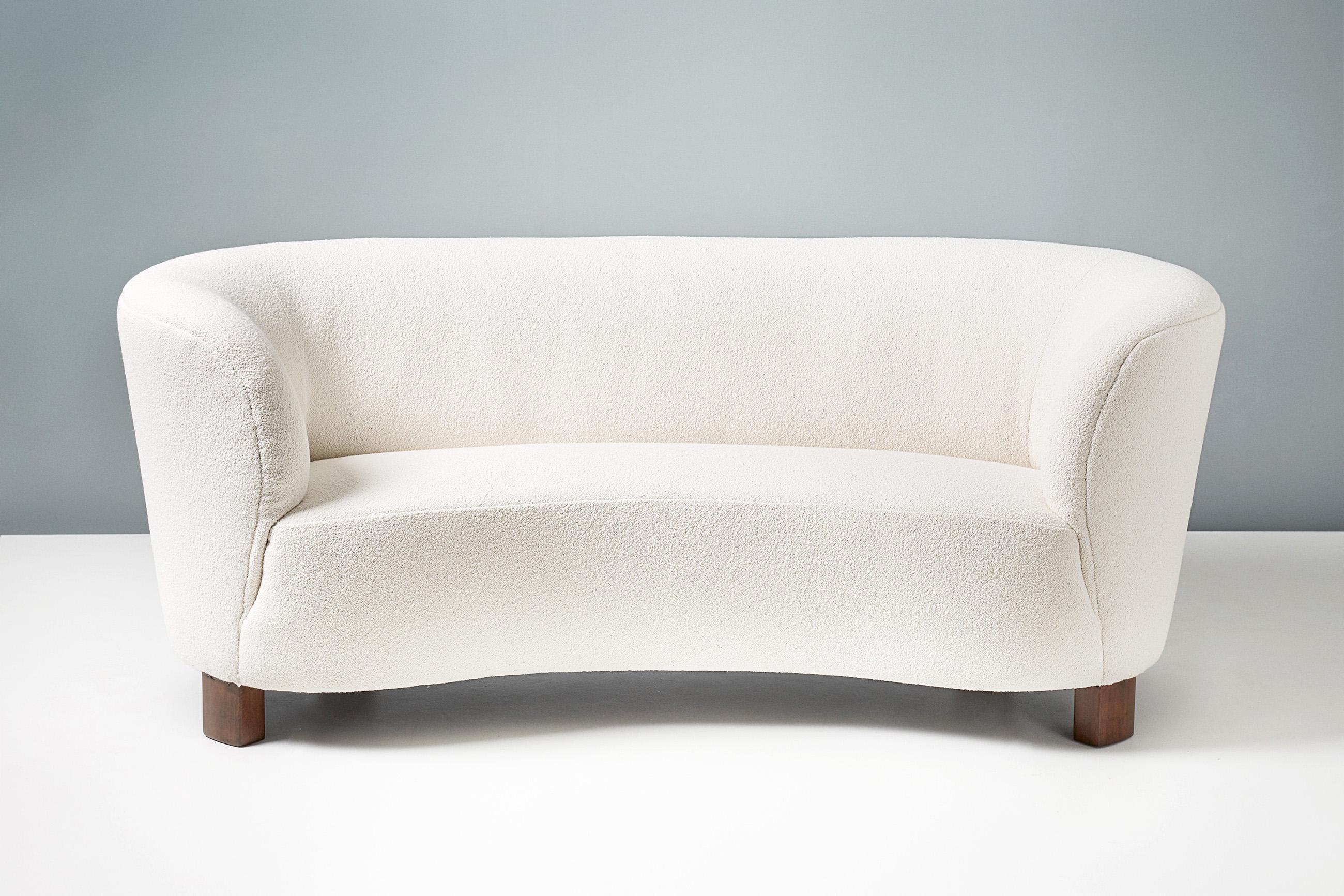 Classic curved sofa from master Danish cabinetmakers Slagelse Mobelvaerk, produced in Denmark circa 1940s. Oiled and stained, patinated oak legs with new off-white cotton-wool mix boucle upholstery from Chase Erwin, UK.