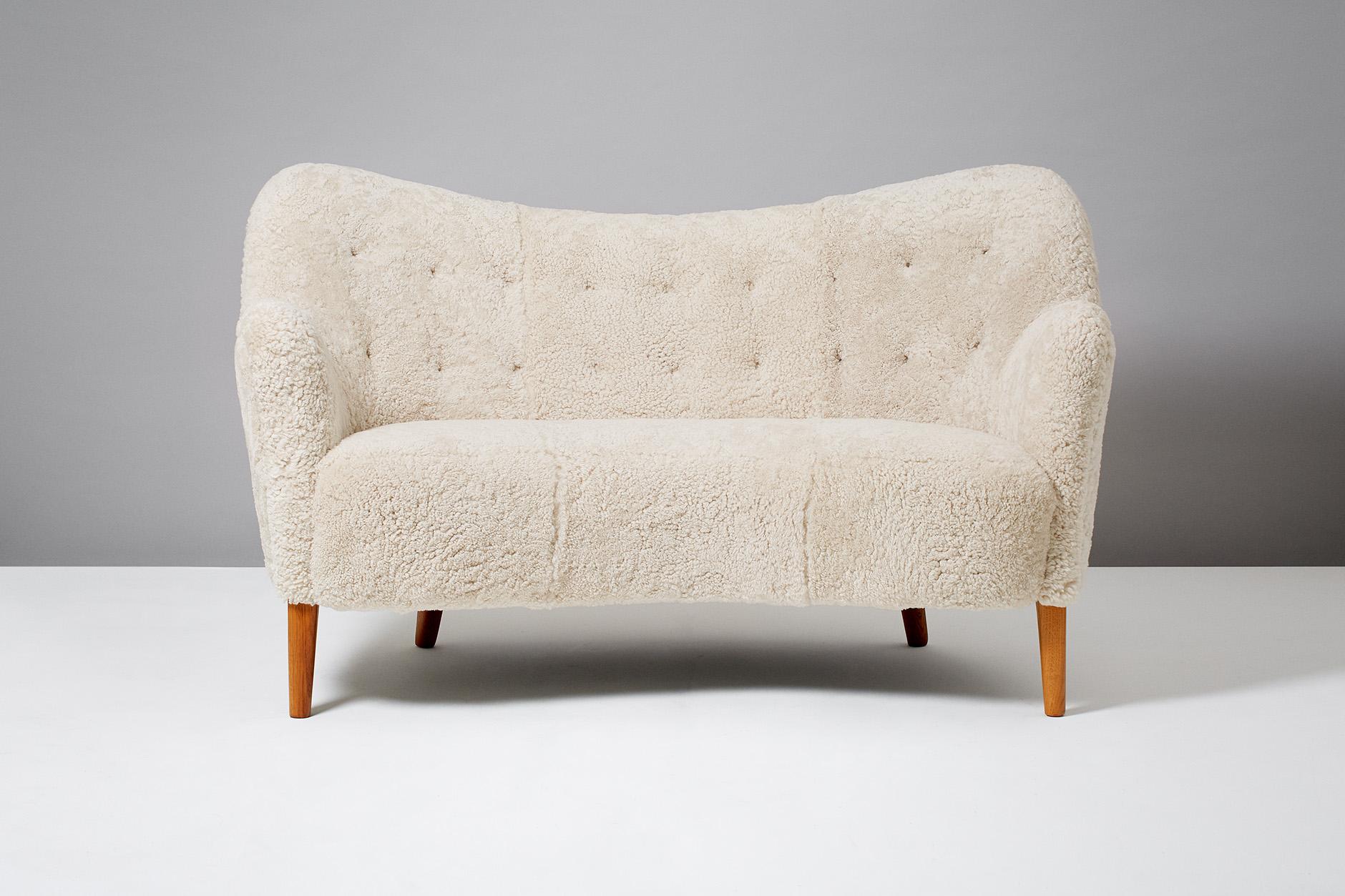 Slagelse Mobelvaerk

Model 185 sofa, 1952

Rarely seen curved loveseat sofa from Danish cabinetmakers Slagelse Mobelvaerk, which is often attributed to designer Nanna Ditzel. Oile oak legs and new sheepskin upholstery from New Zealand.