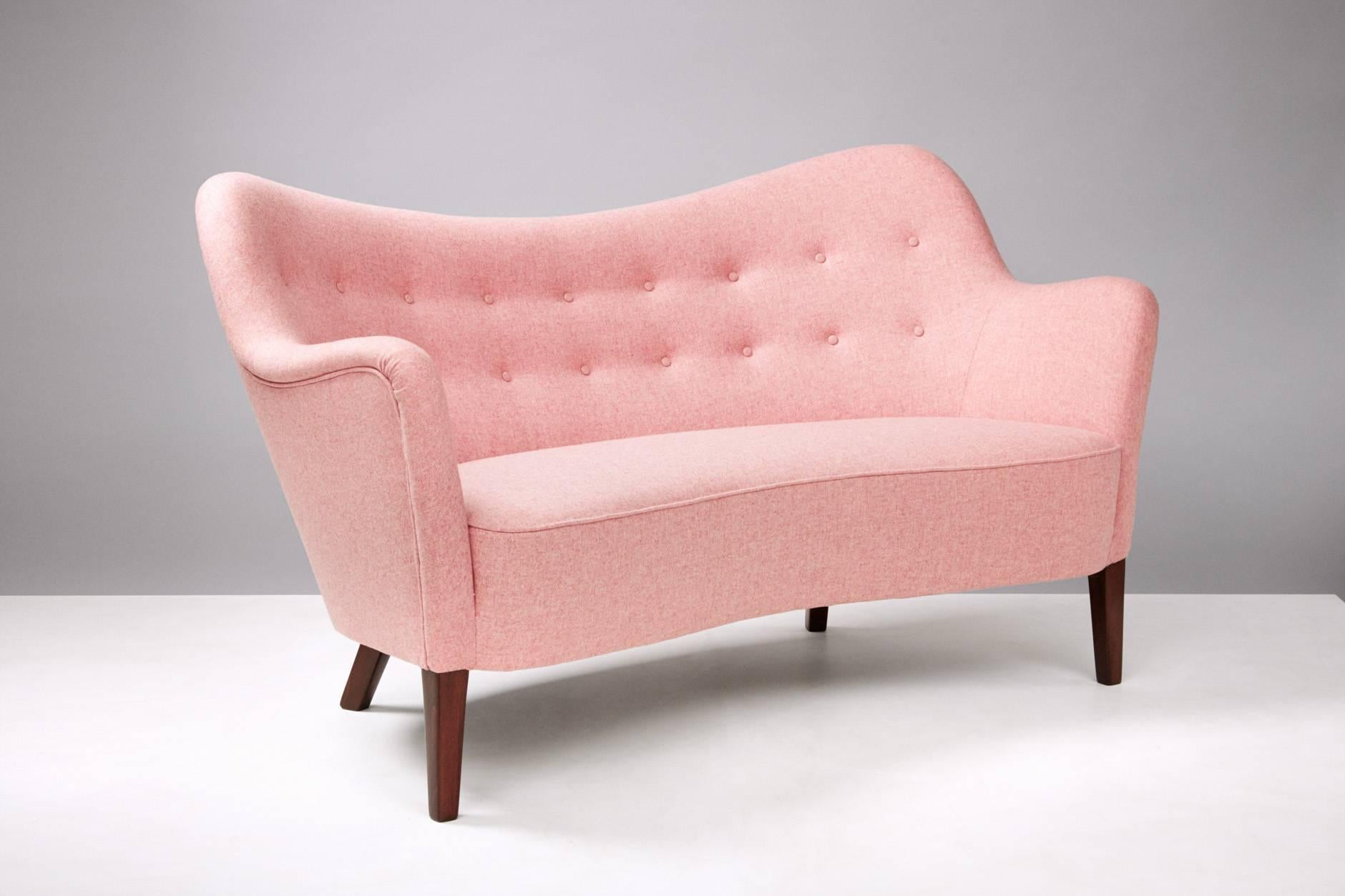 Model 185 sofa, 1952

Rarely seen curved love-seat sofa from unknown designer for Danish cabinetmakers Slagelse Mobler. Often attributed to Nanna Ditzel. Stained beech legs and new wool felt upholstery from Abraham Moon.