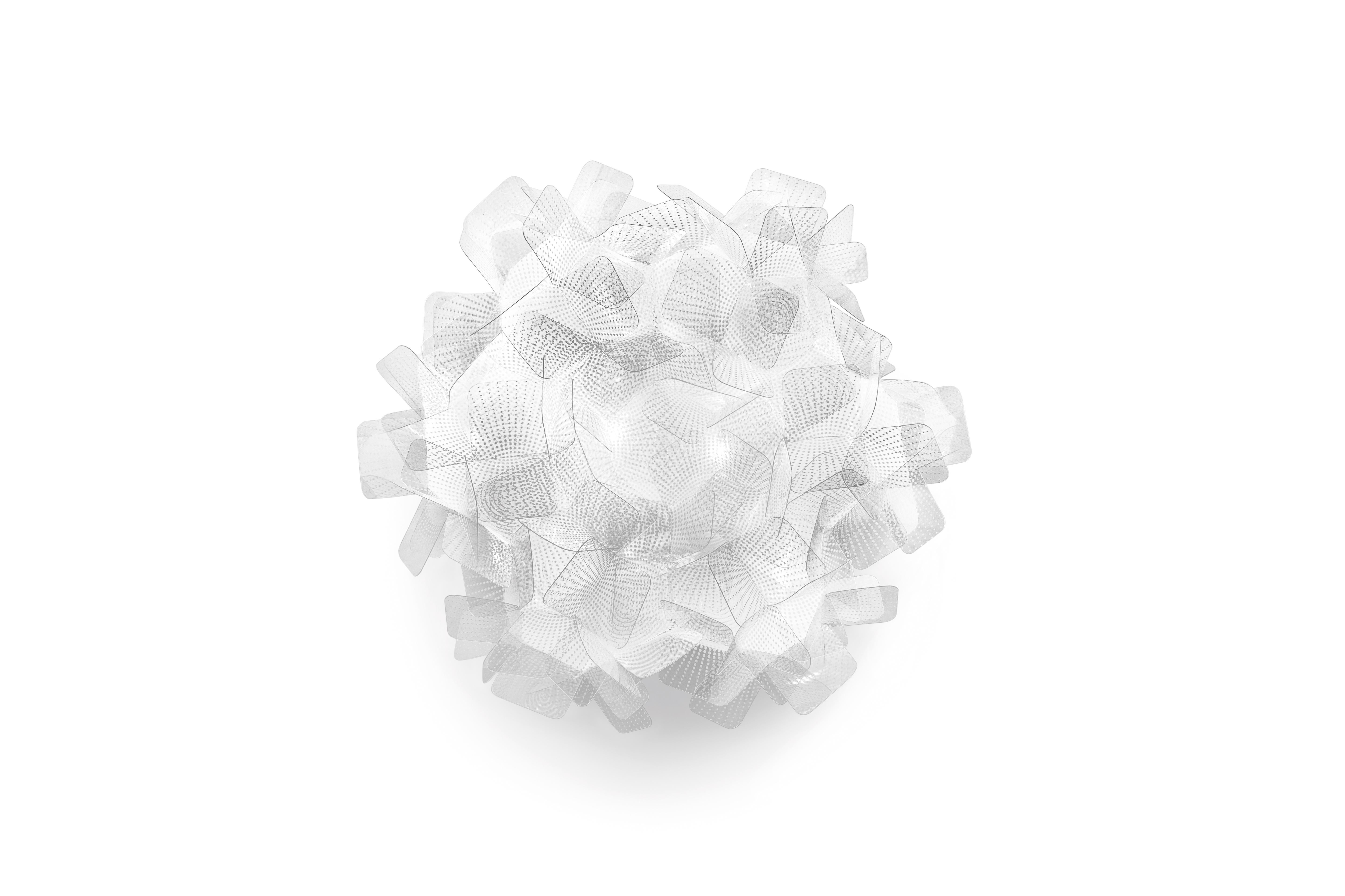 Handcrafted from interlocking Cristalflex petals, complete with a magnetic system that allows for easy installation and cleaning, Clizia Pixel ceiling (or wall sconce) is covered in a white, tech-inspired pattern. A white dusting inside the
