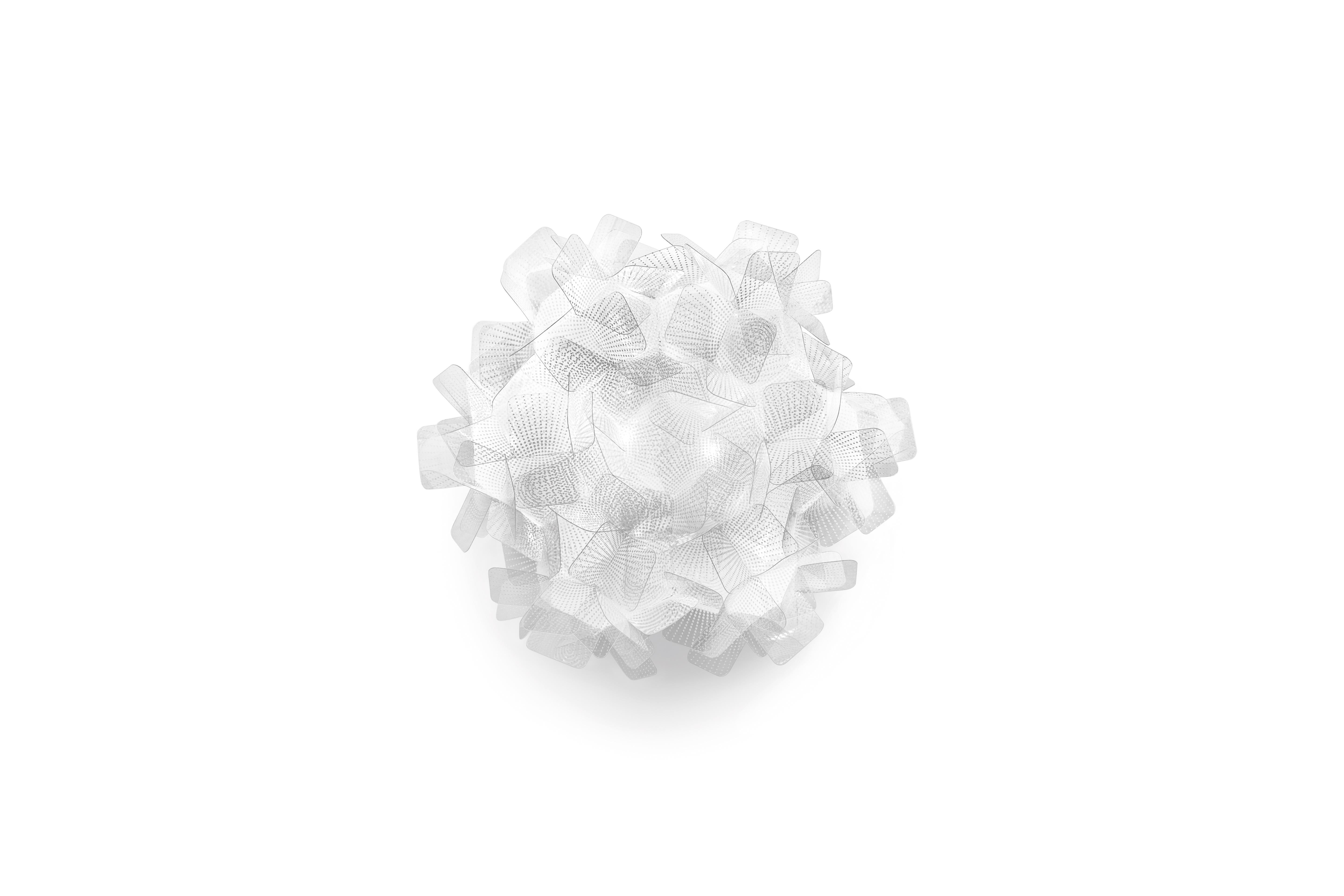 Handcrafted from interlocking Cristalflex® petals, complete with a magnetic system that allows for easy installation and cleaning, Clizia Pixel ceiling (or wall sconce) is covered in a white, tech-inspired pattern. A white dusting inside the