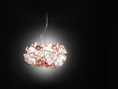 SLAMP Clizia, piccola lampada a sospensione in arancione di Adriano Rachele