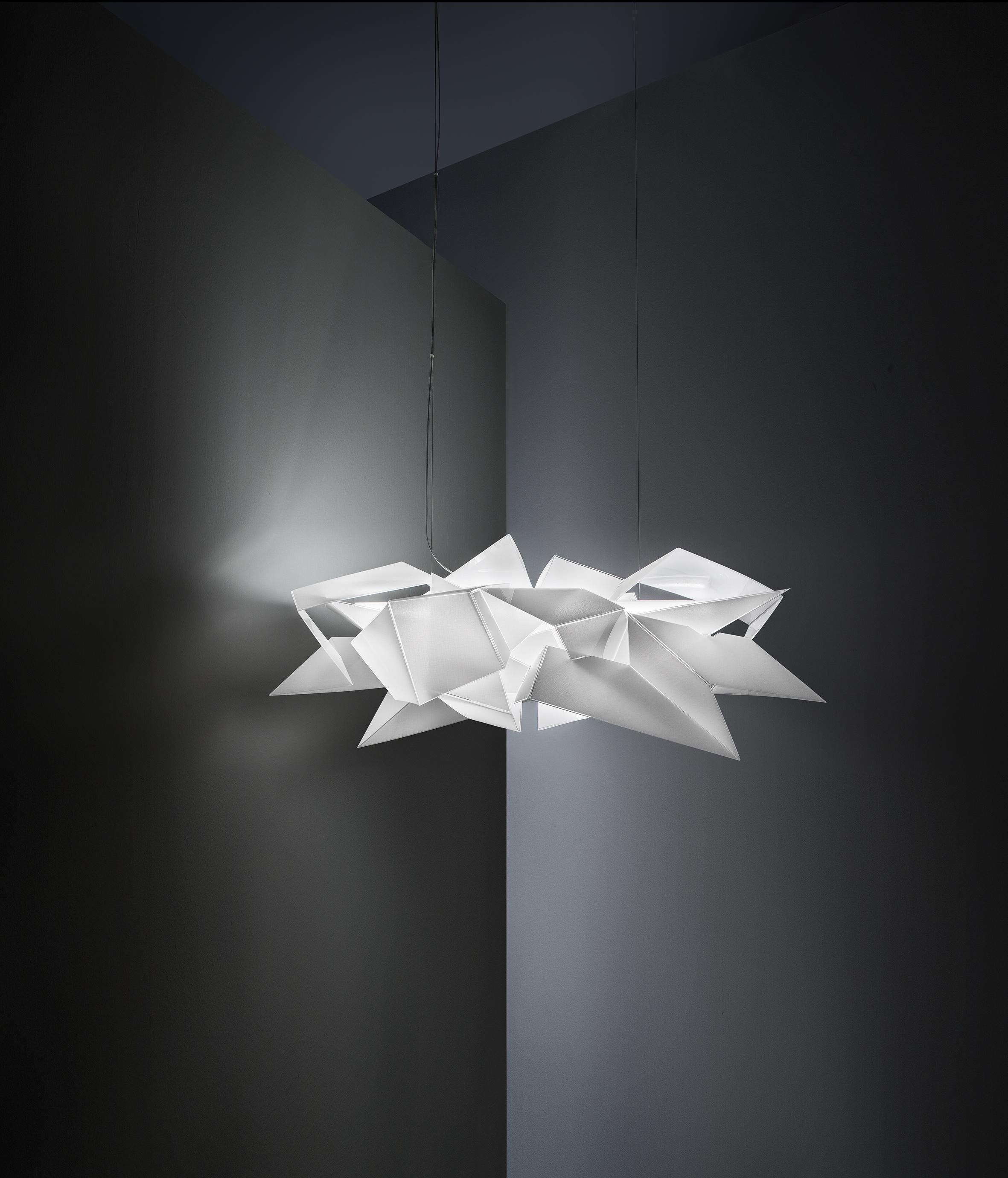 The unique, avant-garde lamp is an asymmetrical series of fragments, seemingly dis-articulated, that stray far from traditional aesthetics; the lamp was inspired by the eponymous Spanish city, where architecture and light make for a mystical