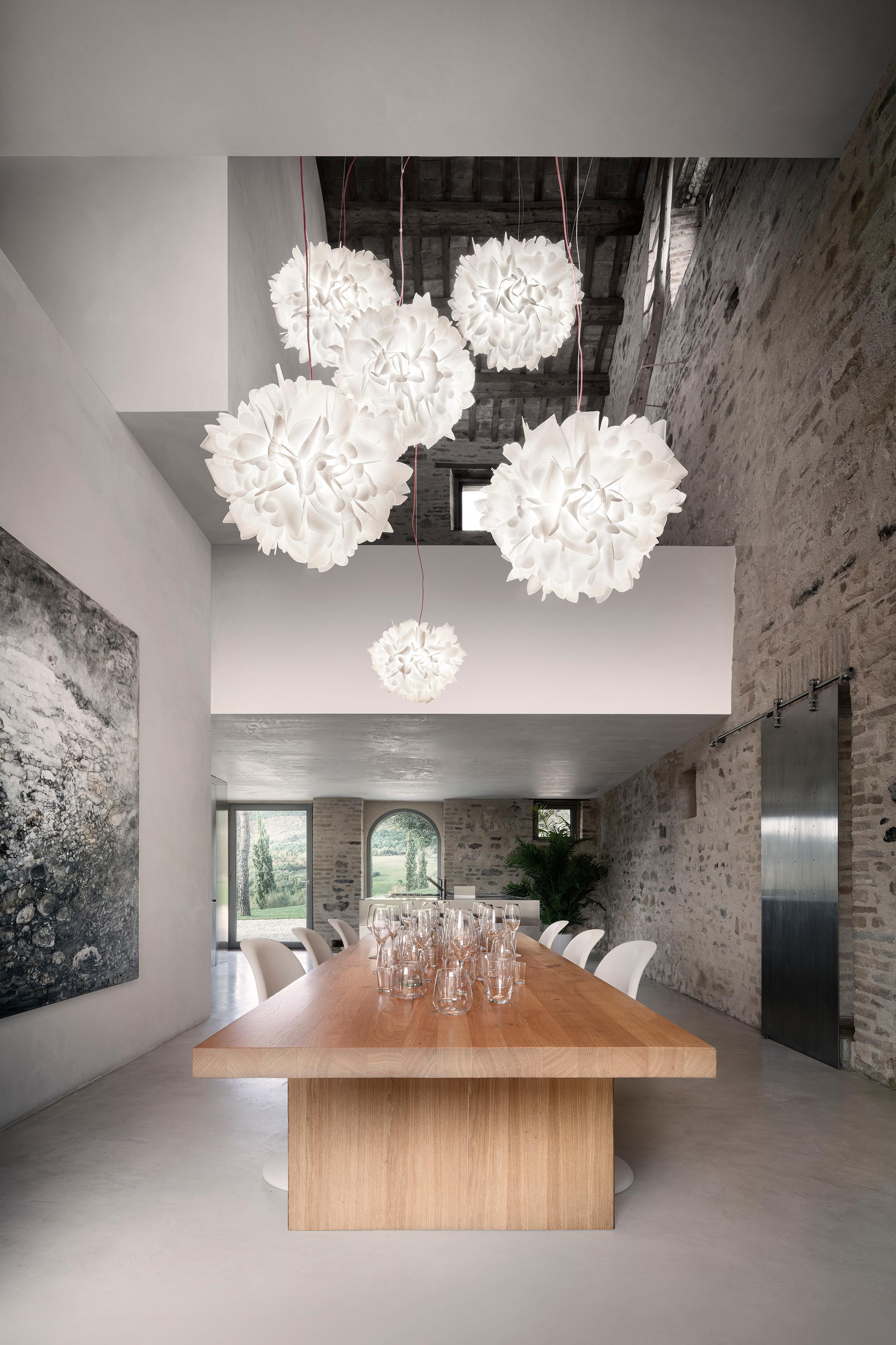 In a time where in the middle of this frenetic life, getting in touch with nature is a luxury, Veli Foliage Suspension Lamp brings something fresh to domestic spaces.
Over 268 handcrafted bends and folds make up every piece in the collection;