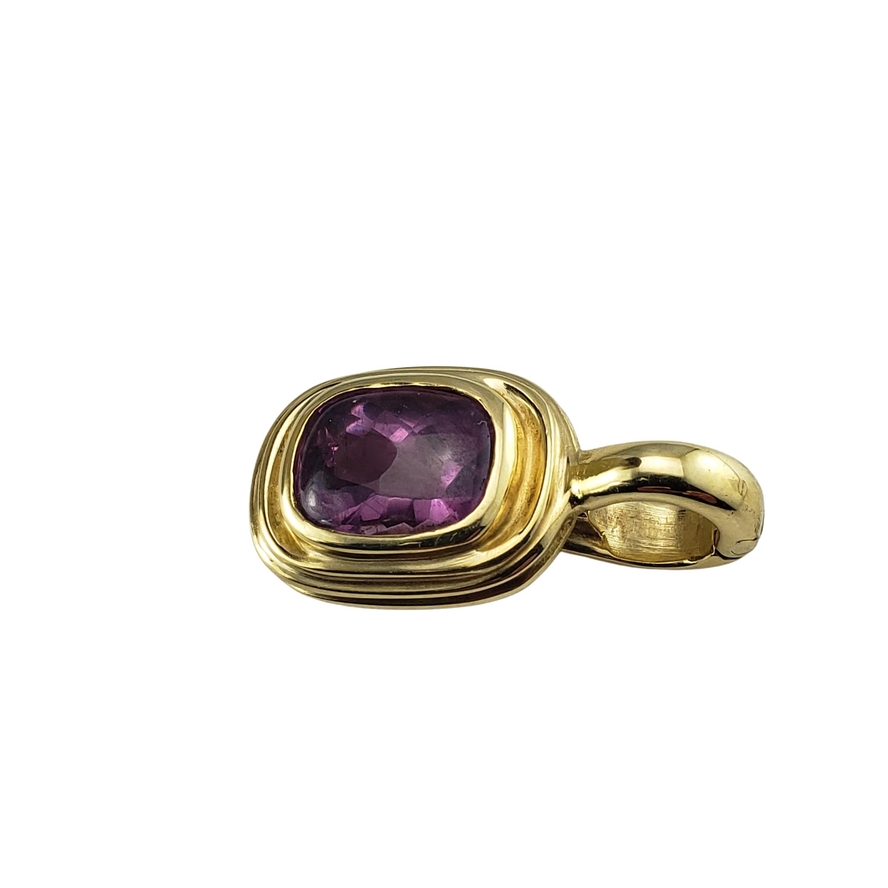 Slane & Slane 18 Karat Yellow Gold and Amethyst Pendant-

This lovely pendant features one amethyst gemstone (10 mm x 8 mm) set in beautifully detailed 18K yellow gold.

Size: 25 mm x 13 mm

Weight:  5.8 dwt. /  9.1 gr.

Hallmark:  750  SS

Very