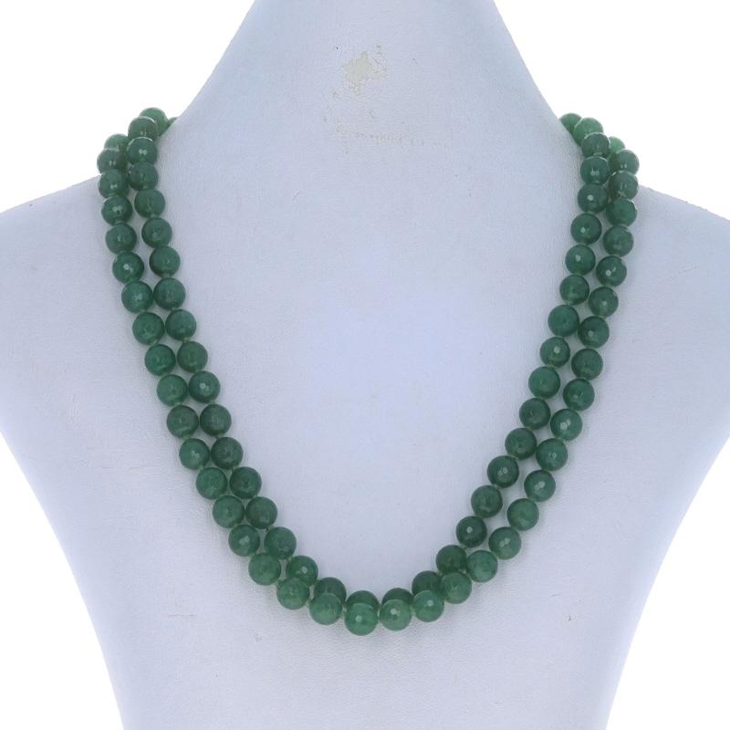 Brand: Slane & Slane

Metal Content: 18k Yellow Gold

Stone Information
Natural Aventurine
Cut: Faceted Bead
Color: Green
Diameter: 8mm

Style: Knotted Double Strand
Fastening Type: Toggle Clasp
Features: Matte Finished Clasp

Measurements
Length: