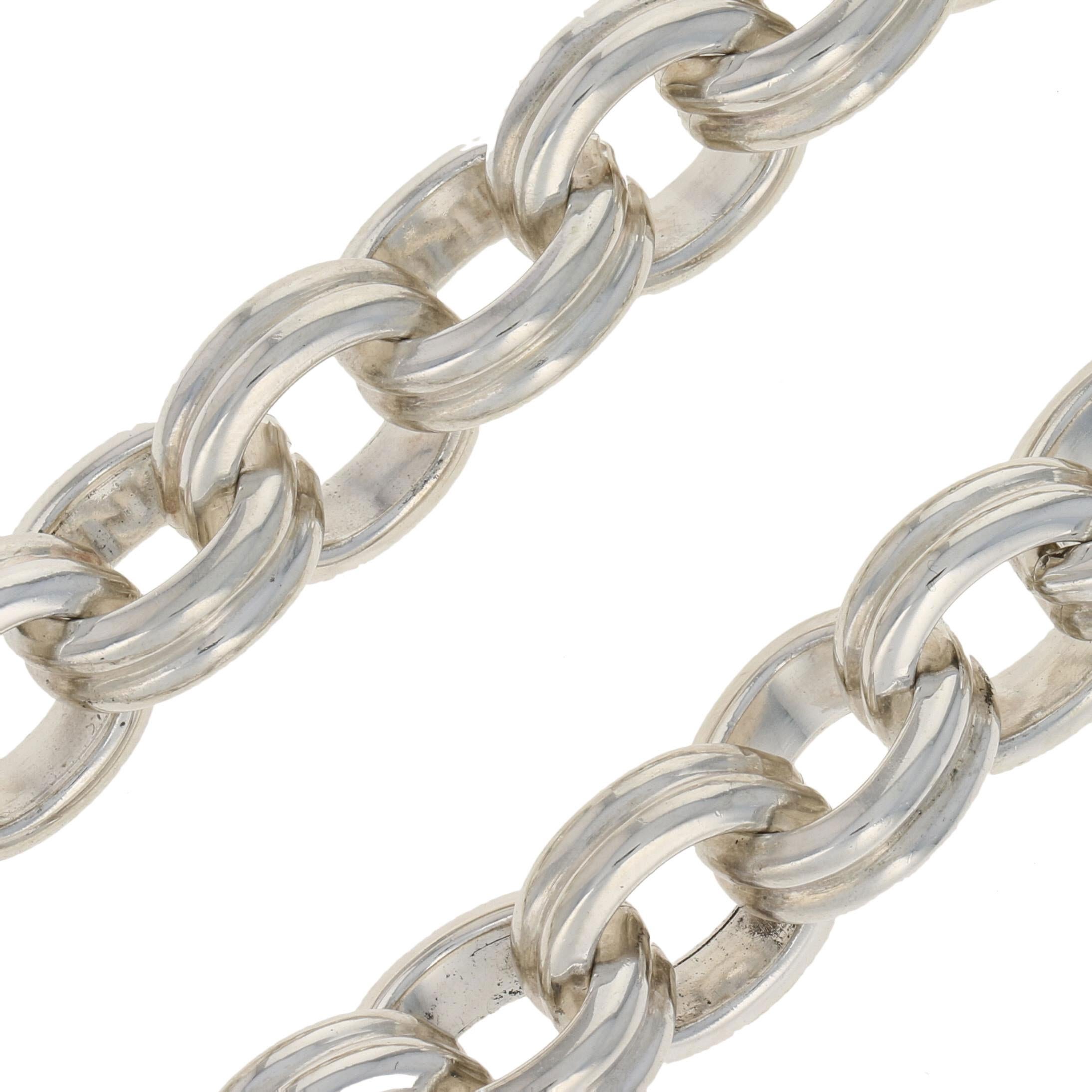 Classically chic, this necklace is destined to become a favorite addition to your jewelry collection! This versatile Slane & Slane cable chain necklace is crafted in sterling silver and displays a ribbed texture on each link for added shine in any