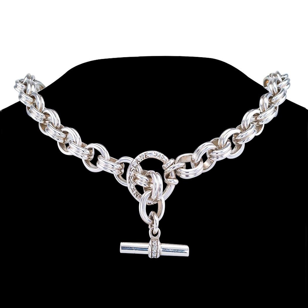  Slane & Slane sterling silver link necklace featuring a diamond set toggle clasp.

Specifications

Diamonds comprise nine round brilliant cut diamonds totaling approximately 0.20 carat, approximately H – I color, I clarity, set in the