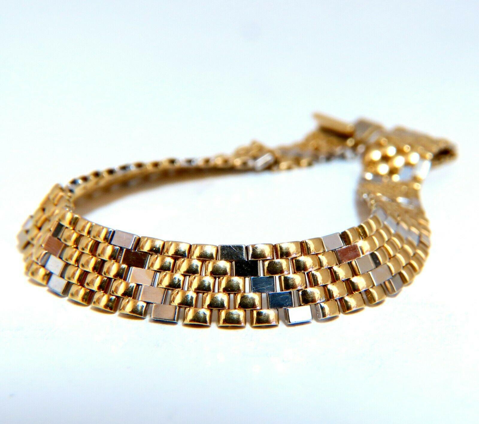 Retro Scaling Box Panther Linked

14kt two toned gold bracelet

7 inch long

8mm wide

12.1 Grams.

Secure & Comfortable locking clasp