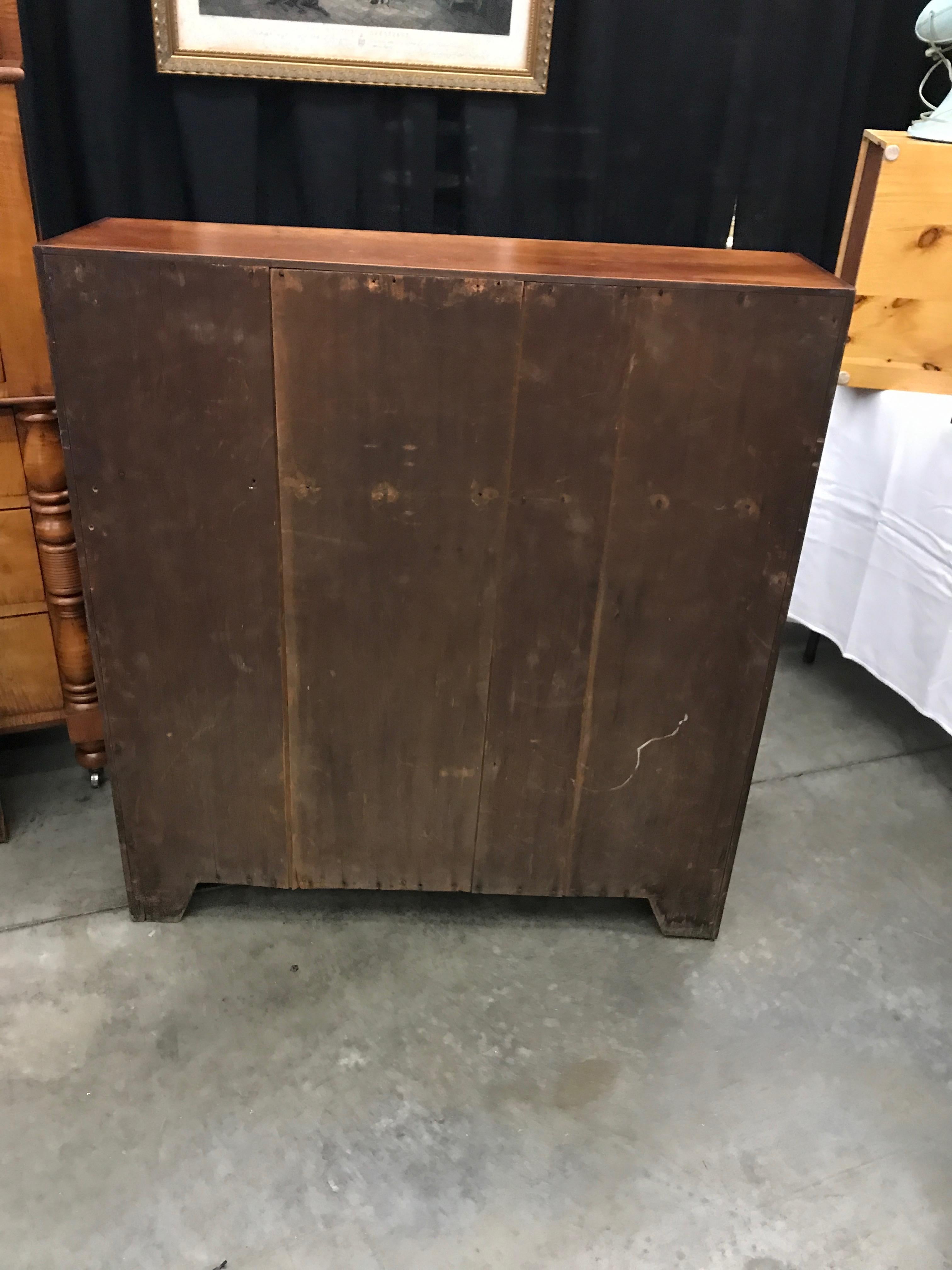 Slant Front Desk in Figured Cherry with Wood Knobs and Brass Escutcheons In Good Condition For Sale In Billerica, MA