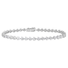 Slanted Heart Shape Diamond Tennis Bracelet (9.74 ct.) in 18K Gold