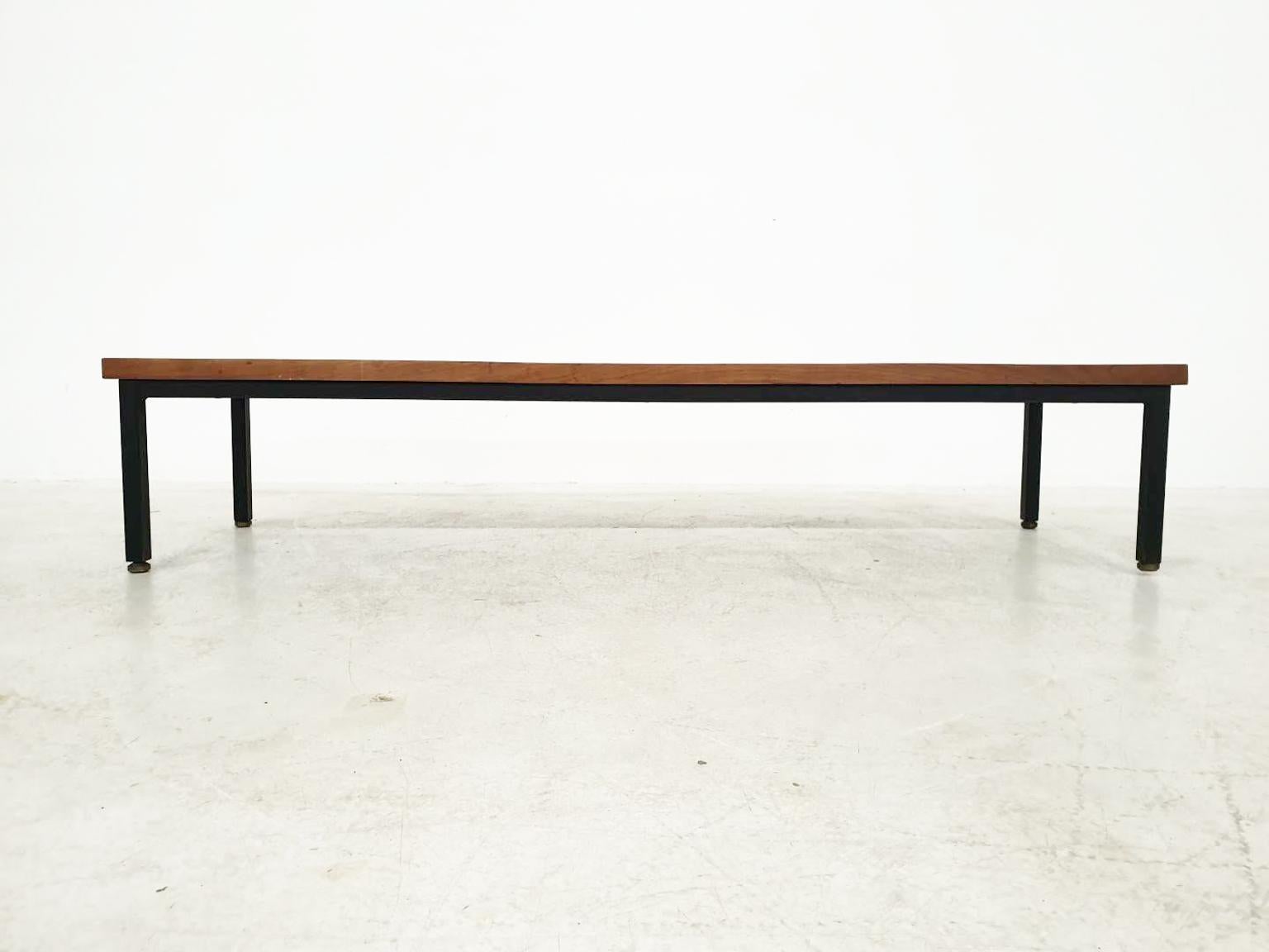 Wood and metal slat bench by Fratelli Saporiti, made and designed in Italy in the 1950s. 

Rare slat bench by high end midcentury furniture producer Saporiti. The bench is made of seven wooden slats on a black metal frame. The height can be adjusted
