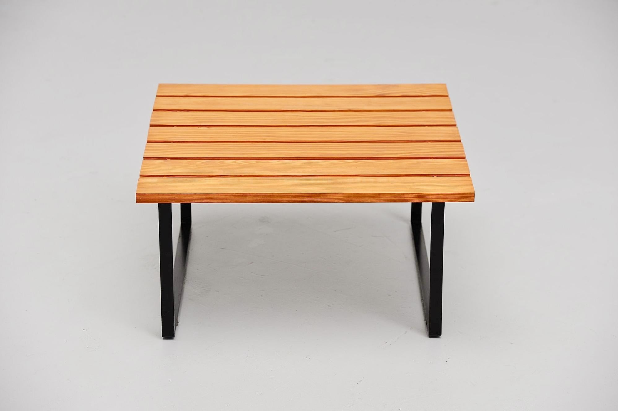 Very nice slat sofa table made and designed by Dutch unknown architect, Holland, 1950. This table has black lacquered sled legs and the top is made of pine wooden slates with dovels to connect. Very nice architectural piece of modernism design. In